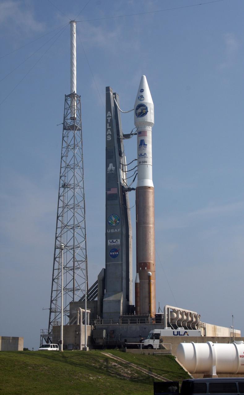 CAPE CANAVERAL, Fla. –  NASA's Lunar Reconnaissance Orbiter, or LRO, and NASA's Lunar Crater Observation and Sensing Satellite, known as LCROSS, stand ready for liftoff on an Atlas V/Centaur rocket from Launch Pad 41 at Cape Canaveral Air Force Station in Florida.  At left is one of the lightning towers that surround the pad. LRO and LCROSS are the first missions in NASA's plan to return humans to the moon and begin establishing a lunar outpost by 2020. The LRO also includes seven  instruments that will help NASA characterize the moon's surface:  DIVINER, LAMP, LEND, LOLA , CRATER, Mini-RF and LROC.   Launch is scheduled for 5:12 p.m. EDT June 18.  Photo credit: NASA/Ken Thornsley