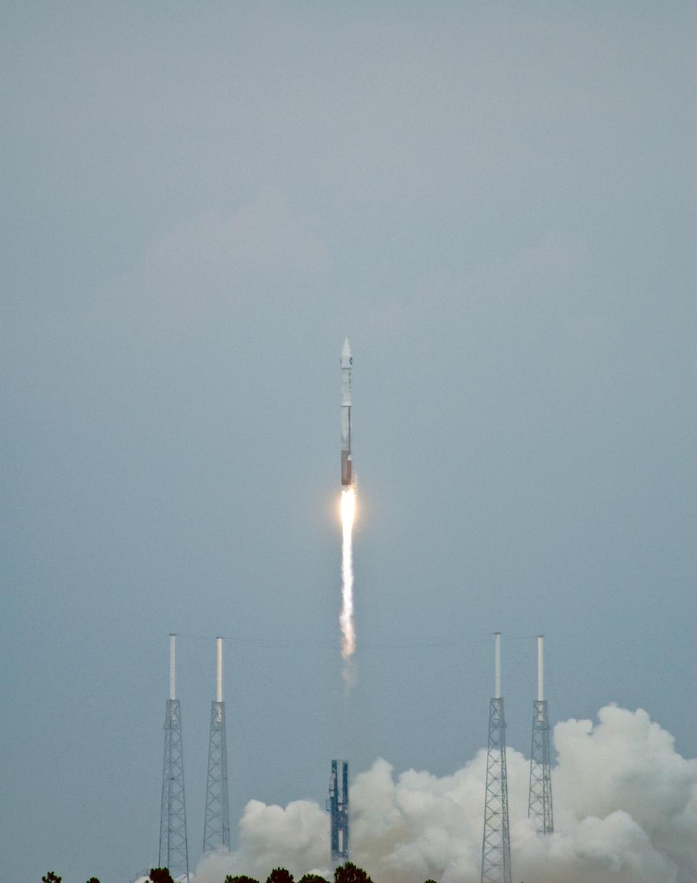 CAPE CANAVERAL, Fla. – Rising above the lightning towers around the pad, NASA's Lunar Reconnaissance Orbiter, or LRO, and NASA's Lunar Crater Observation and Sensing Satellite, known as LCROSS, lifts off from Launch Pad 41 at Cape Canaveral Air Force Station in Florida.   LRO and LCROSS are the first missions in NASA's plan to return humans to the moon and begin establishing a lunar outpost by 2020. The LRO also includes seven instruments that will help NASA characterize the moon's surface:  DIVINER, LAMP, LEND, LOLA , CRATER, Mini-RF and LROC.   Launch was on-time at 5:32 p.m. EDT June 18.  Photo credit: NASA/Sandra Joseph
