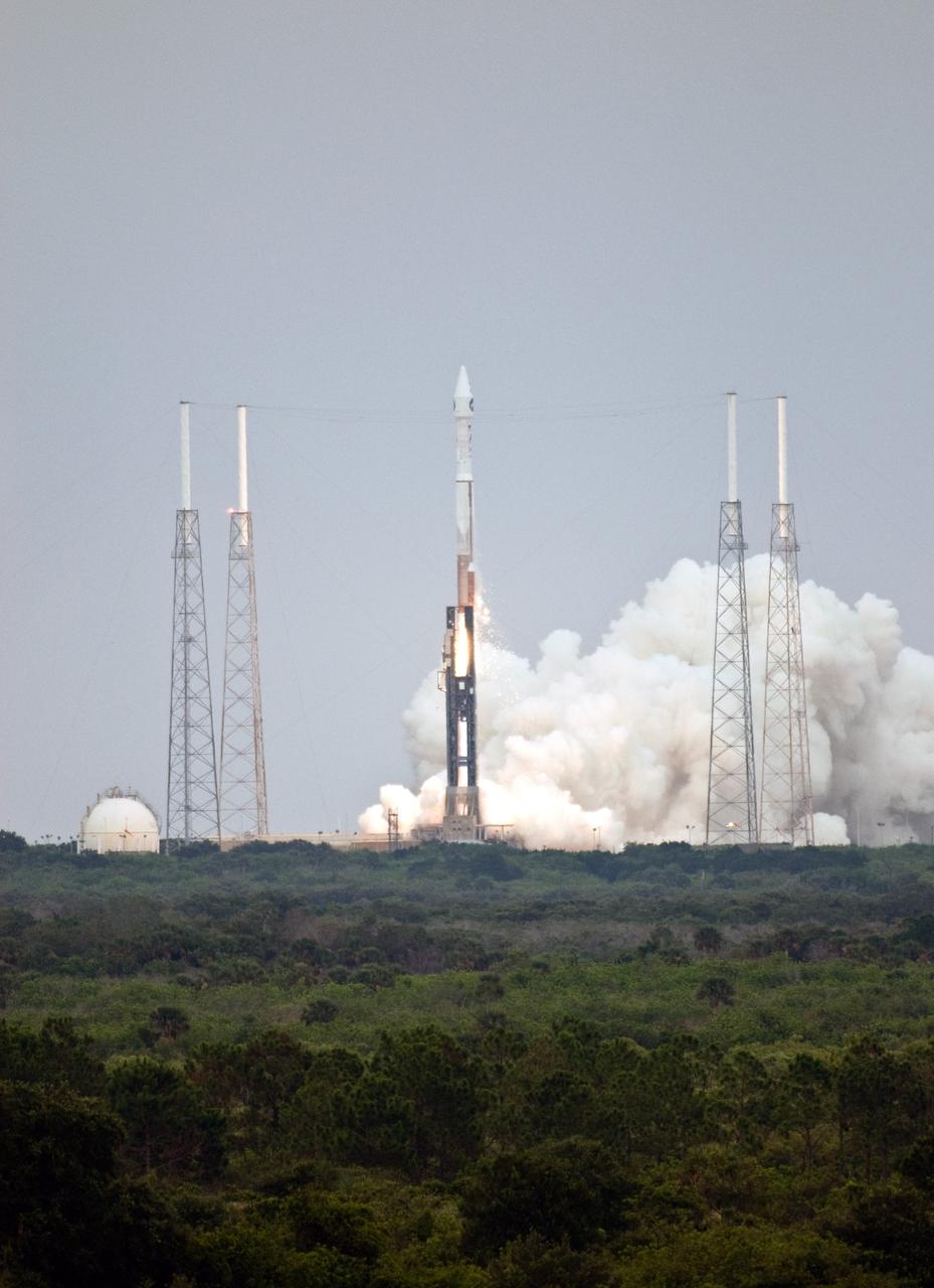 CAPE CANAVERAL, Fla. – Smoke and steam roll across the launch pad as NASA's Lunar Reconnaissance Orbiter, or LRO, and NASA's Lunar Crater Observation and Sensing Satellite, known as LCROSS, lifts off atop the Atlas V/Centaur rocket from Launch Complex 41 at Cape Canaveral Air Force Station in Florida.  Surrounding the pad are lightning towers.  LRO and LCROSS are the first missions in NASA's plan to return humans to the moon and begin establishing a lunar outpost by 2020. The LRO also includes seven instruments that will help NASA characterize the moon's surface:  DIVINER, LAMP, LEND, LOLA , CRATER, Mini-RF and LROC.   Launch was on-time at 5:32 p.m. EDT June 18.  Photo credit: NASA/Kim Shiflett
