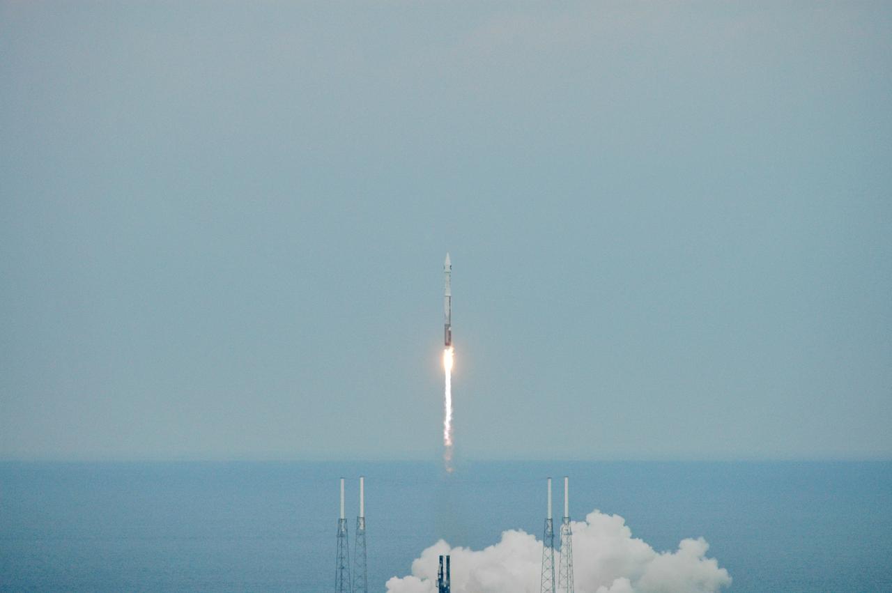 CAPE CANAVERAL, Fla. – The Atlas V/Centaur rocket carrying NASA's Lunar Reconnaissance Orbiter, or LRO, and NASA's Lunar Crater Observation and Sensing Satellite, known as LCROSS, leaps into the sky with a tail of smoke behind as it lifts off from Launch Complex 41 at Cape Canaveral Air Force Station in Florida. Surrounding the pad below are lightning towers.  LRO and LCROSS are the first missions in NASA's plan to return humans to the moon and begin establishing a lunar outpost by 2020. The LRO also includes seven instruments that will help NASA characterize the moon's surface:  DIVINER, LAMP, LEND, LOLA , CRATER, Mini-RF and LROC.   Launch was on-time at 5:32 p.m. EDT June 18.  Photo credit: NASA/Jeffery Marino