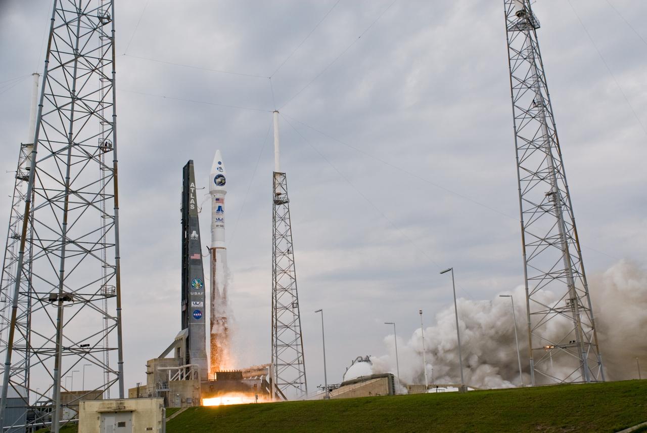 CAPE CANAVERAL, Fla. – Fire and smoke signal the liftoff of the Atlas V/Centaur carrying NASA's Lunar Reconnaissance Orbiter, or LRO, and NASA's Lunar Crater Observation and Sensing Satellite, known as LCROSS, toward orbit around the moon.  Launch from Launch Complex 41 at Cape Canaveral Air Force Station in Florida was on-time at 5:32 p.m. EDT. The towers around the pad are part of the lightning protection system.   LRO and LCROSS are the first missions in NASA's plan to return humans to the moon and begin establishing a lunar outpost by 2020. The LRO also includes seven instruments that will help NASA characterize the moon's surface:  DIVINER, LAMP, LEND, LOLA , CRATER, Mini-RF and LROC.   Photo credit: NASA/Tom Farrar, Kevin O'Connell