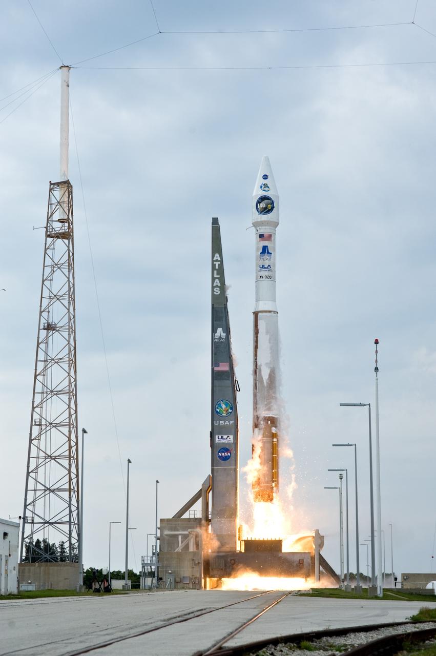CAPE CANAVERAL, Fla. – Fire signals liftoff of the Atlas V/Centaur carrying NASA's Lunar Reconnaissance Orbiter, or LRO, and NASA's Lunar Crater Observation and Sensing Satellite, known as LCROSS, from Launch Complex 41 at Cape Canaveral Air Force Station in Florida. The tower at left is part of the lightning protection system on the pad. LRO and LCROSS are the first missions in NASA's plan to return humans to the moon and begin establishing a lunar outpost by 2020. The LRO also includes seven instruments that will help NASA characterize the moon's surface:  DIVINER, LAMP, LEND, LOLA , CRATER, Mini-RF and LROC.  Launch was on-time at 5:32 p.m. EDT.  Photo credit: NASA/Tom Farrar, Kevin O'Connell