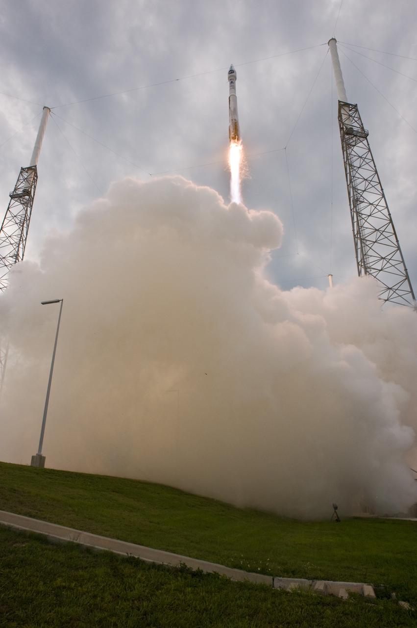 CAPE CANAVERAL, Fla. – On Launch Complex 41 at Cape Canaveral Air Force Station in Florida, smoke fills the pad as the Atlas V/Centaur carrying NASA's Lunar Reconnaissance Orbiter, or LRO, and NASA's Lunar Crater Observation and Sensing Satellite, known as LCROSS, lifts off.  LRO and LCROSS are the first missions in NASA's plan to return humans to the moon and begin establishing a lunar outpost by 2020. The LRO also includes seven instruments that will help NASA characterize the moon's surface:  DIVINER, LAMP, LEND, LOLA , CRATER, Mini-RF and LROC.  Launch was on-time at 5:32 p.m. EDT.  Photo credit: NASA/Sandra Joseph, Tony Gray
