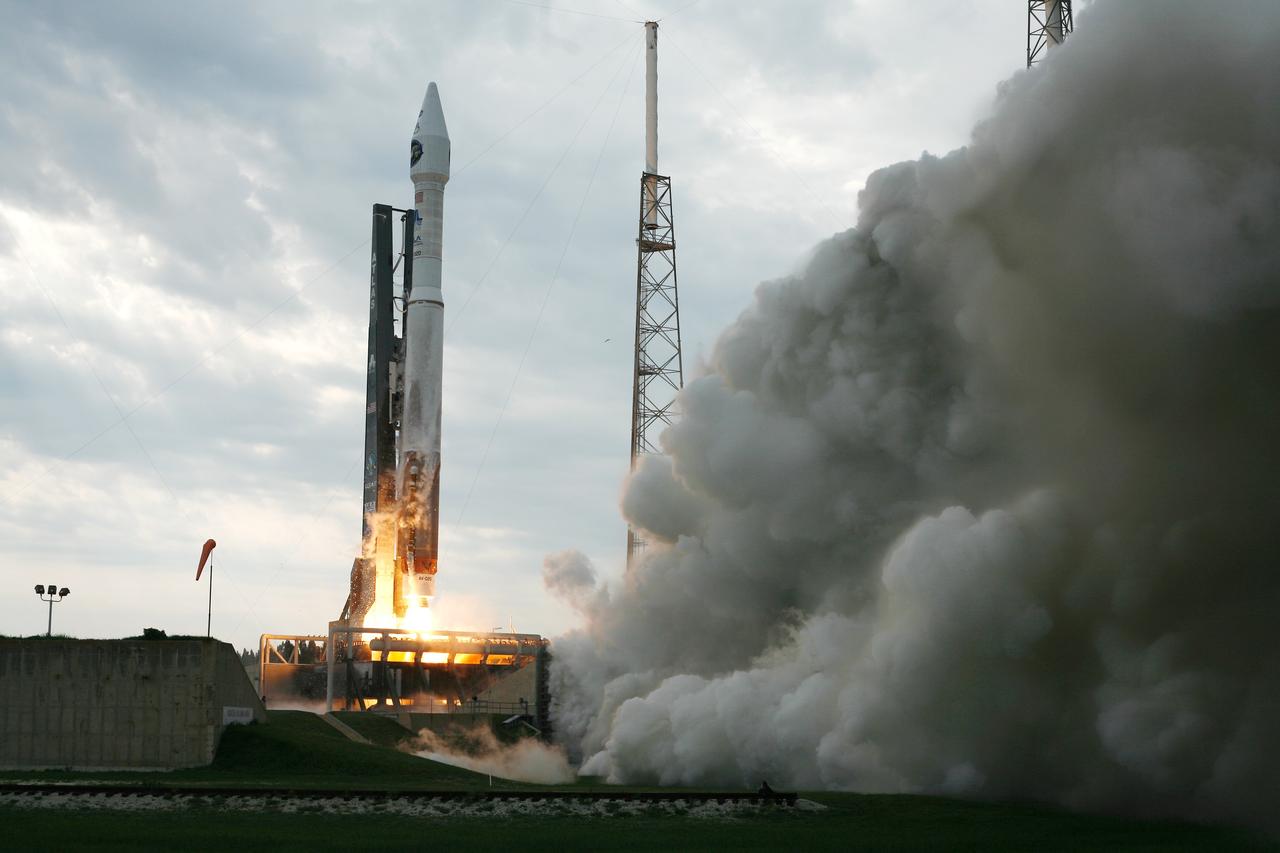 CAPE CANAVERAL, Fla. – Smoke rolls across Launch Pad 41 at Cape Canaveral Air force Station in Florida as the Atlas V/Centaur rocket topped with NASA's Lunar Reconnaissance Orbiter, or LRO, and NASA's Lunar Crater Observation and Sensing Satellite, known as LCROSS,  lifts off.  Launch was on-time at 5:32 p.m. EDT June 18.  LRO and LCROSS are the first missions in NASA's plan to return humans to the moon and begin establishing a lunar outpost by 2020. The LRO also includes seven instruments that will help NASA characterize the moon's surface:  DIVINER, LAMP, LEND, LOLA , CRATER, Mini-RF and LROC.  Photo courtesy of Scott Andrews
