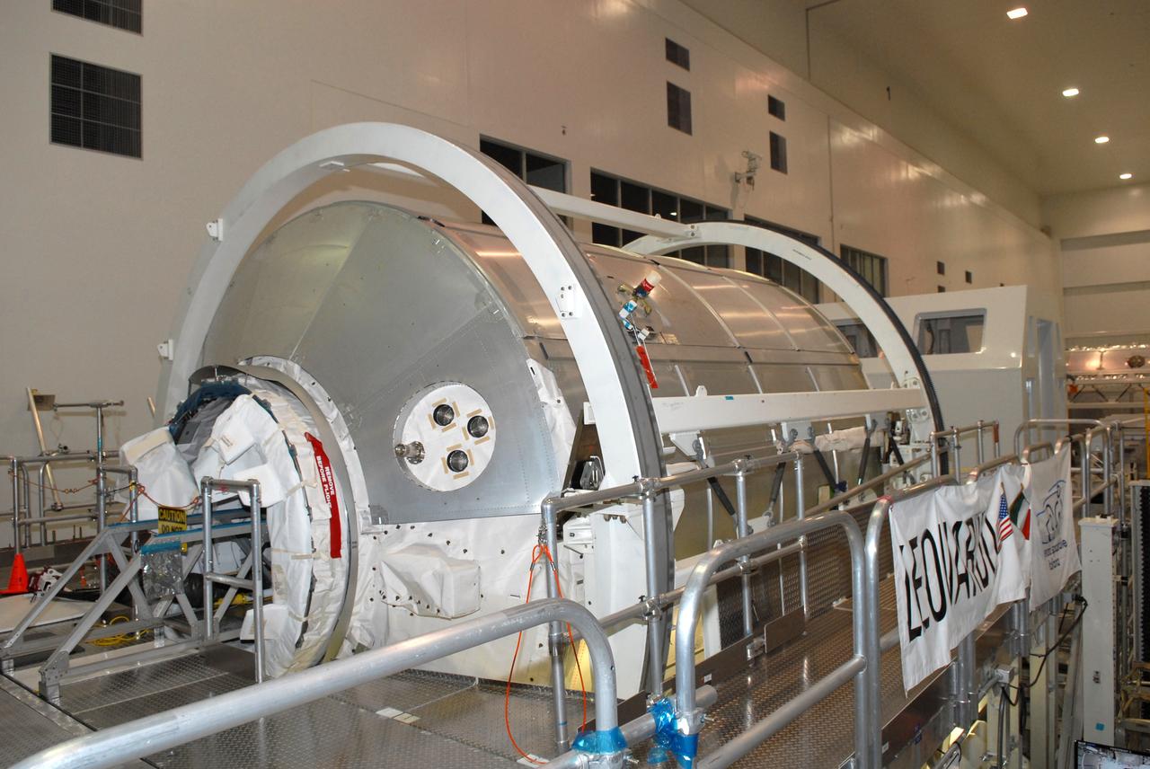 CAPE CANAVERAL, Fla. – In the Space Station Processing Facility at NASA's Kennedy Space Center in Florida, the Leonardo multi-purpose logistics module is being prepared for the STS-128 mission to the International Space Station aboard space shuttle Discovery.  The module will carry among its science and storage racks the Combined Operational Load Bearing External Resistance Treadmill, or C.O.L.B.E.R.T.  The treadmill is named after comedian Stephen Colbert, the host of Comedy Central’s “The Colbert Report.” Colbert urged his viewers to suggest the name “Colbert” as the name for the station’s Node 3 module. Although his name did receive the most entries in an Internet polling contest, NASA chose the name “Tranquility” to honor the accomplishments of the Apollo 11 mission. COLBERT will be installed in Tranquility after the node arrives at the station next year. Launch of STS-128 is targeted for Aug. 7, 2009.  Photo credit: NASA/Jim Grossmann