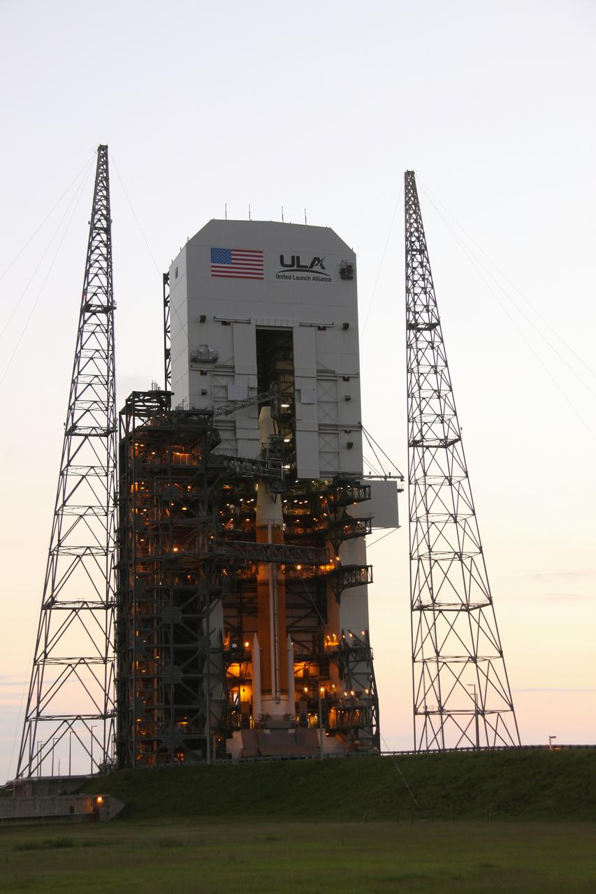 CAPE CANAVERAL, Fla. – As the sun rises on Launch Complex 37 at Cape Canaveral Air Force Station, preparations are under way to roll the mobile service tower from around the Boeing Delta IV rocket that will launch the GOES-O satellite into orbit. The terminal countdown to the liftoff of GOES-O will begin at 12:59 p.m. EDT for a launch window that extends from 6:14 p.m. to 7:14 p.m. June 26. The latest Geostationary Operational Environmental Satellite, GOES-O was developed by NASA for the National Oceanic and Atmospheric Administration, or NOAA. Each of the GOES satellites continuously provides observations of 60 percent of the Earth including the continental United States, providing weather monitoring and forecast operations as well as a continuous and reliable stream of environmental information and severe weather warnings. Once in orbit, GOES-O will be designated GOES-14, and NASA will provide on-orbit checkout and then transfer operational responsibility to NOAA. Photo credit: NASA/Jack Pfaller