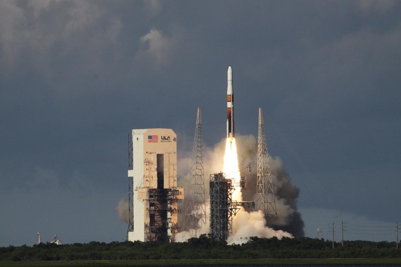 CAPE CANAVERAL, Fla. – Rising above the pad's fixed service tower, a Delta IV rocket soars into the sky with the GOES-O satellite aboard.  Liftoff was at 6:51 p.m. EDT from Launch Complex 37 at Cape Canaveral Air Force Station in Florida. The first attempt to launch GOES-O, on June 26, was scrubbed due to thunderstorms in the vicinity of Cape Canaveral. The latest Geostationary Operational Environmental Satellite, GOES-O was developed by NASA for the National Oceanic and Atmospheric Administration, or NOAA. Each of the GOES satellites continuously provides observations of 60 percent of the Earth including the continental United States, providing weather monitoring and forecast operations as well as a continuous and reliable stream of environmental information and severe weather warnings. Once in orbit, GOES-O will be designated GOES-14, and NASA will provide on-orbit checkout and then transfer operational responsibility to NOAA.    Photo credit: NASA/Jack Pfaller