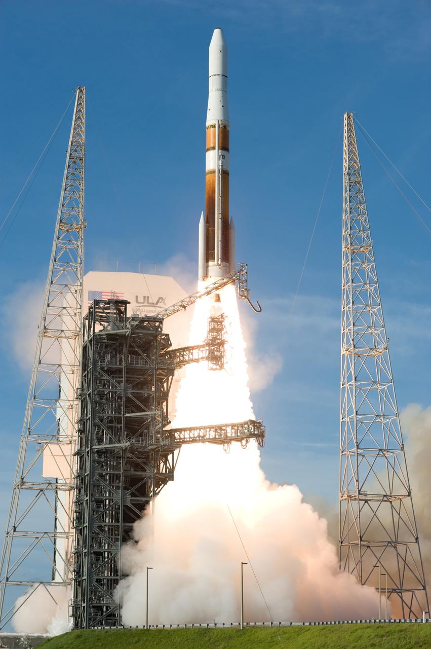 CAPE CANAVERAL, Fla. – Rising above the pad's fixed service tower, a Delta IV rocket soars into the sky with the GOES-O satellite aboard.  Liftoff was at 6:51 p.m. EDT from Launch Complex 37 at Cape Canaveral Air Force Station in Florida. The first attempt to launch GOES-O, on June 26, was scrubbed due to thunderstorms in the vicinity of Cape Canaveral. The latest Geostationary Operational Environmental Satellite, GOES-O was developed by NASA for the National Oceanic and Atmospheric Administration, or NOAA. Each of the GOES satellites continuously provides observations of 60 percent of the Earth including the continental United States, providing weather monitoring and forecast operations as well as a continuous and reliable stream of environmental information and severe weather warnings. Once in orbit, GOES-O will be designated GOES-14, and NASA will provide on-orbit checkout and then transfer operational responsibility to NOAA.    Photo credit: NASA/Tom Farrar, Sandy Joseph