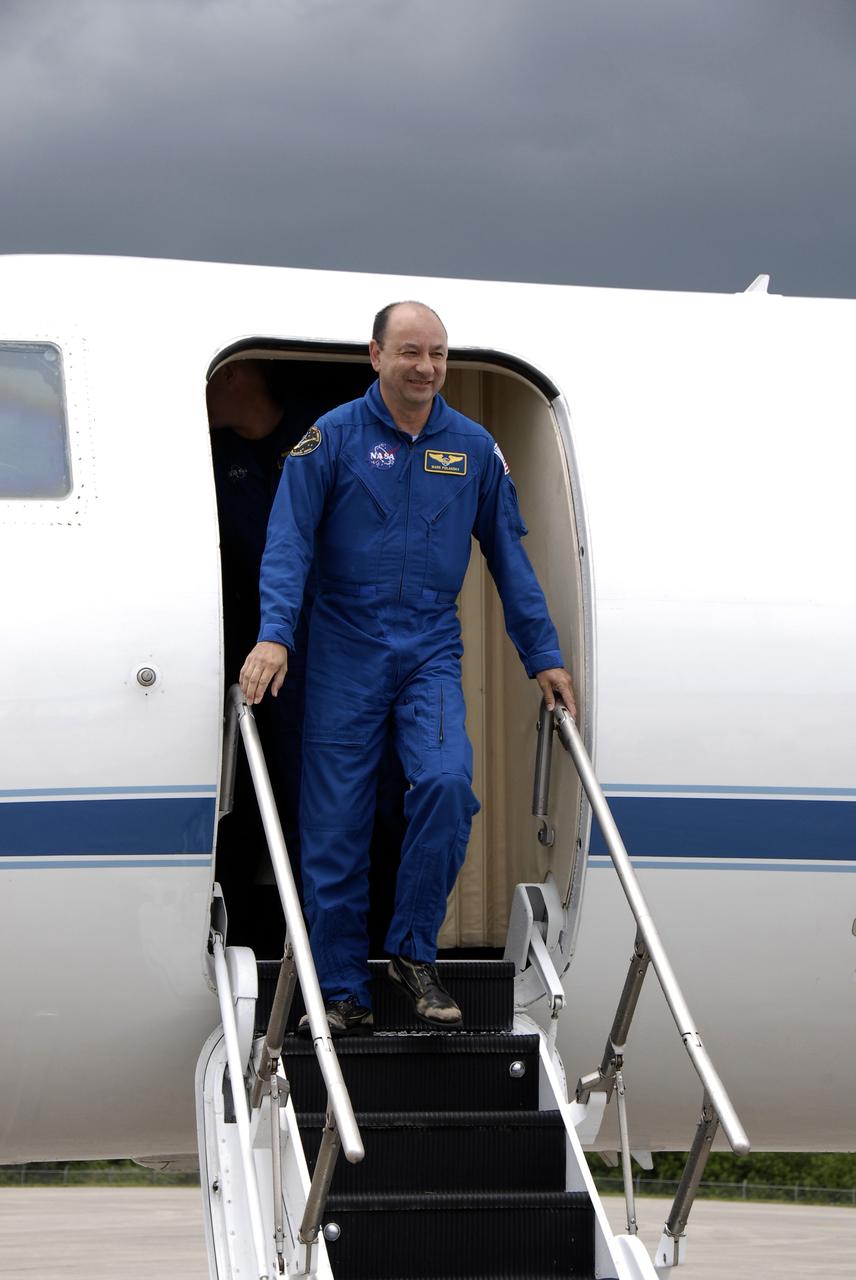 CAPE CANAVERAL, Fla. – The STS-127 crew members arrive at NASA's Kennedy Space Center in Florida to prepare for space shuttle Endeavour's July 11 launch on the 29th assembly flight to the International Space Station.  Exiting the aircraft first is Commander Mark Polansky, who will be making his third shuttle flight. This will be the third launch attempt due to the leak of hydrogen gas at the Ground Umbilical Carrier Plate during tanking on two previous attempts, June 13 and June 17. The STS-127 mission is the final of three flights dedicated to the assembly of the Japan Aerospace Exploration Agency's Kibo laboratory complex. Endeavour will deliver the Japanese Experiment Module's Exposed Facility, or JEM-EF, and the Experiment Logistics Module-Exposed Section, or ELM-ES.  Photo credit: NASA/Kim Shiflett