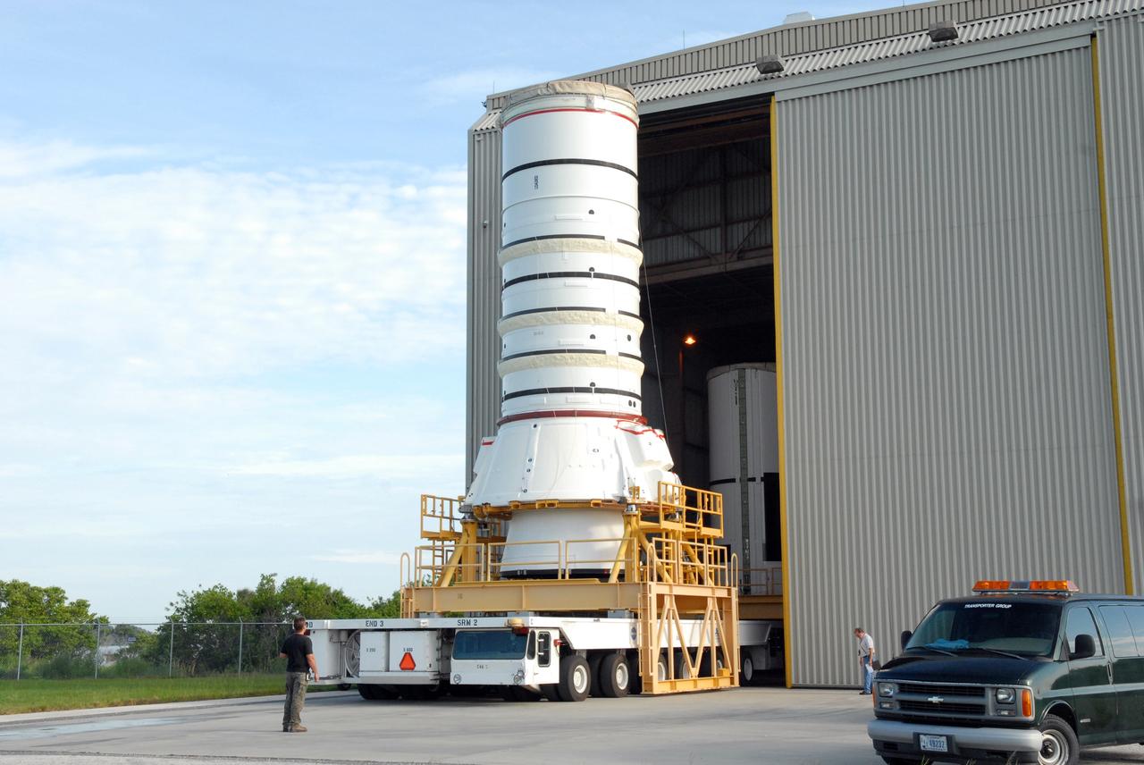 CAPE CANAVERAL, Fla. – The Ares I-X aft assembly is moved out of the Rotation, Processing and Surge Facility at NASA's Kennedy Space Center in Florida. It is going to the Vehicle Assembly Building for stacking to complete the Ares I-X test vehicle. The aft assembly will be the first segment to be stacked on the mobile launch platform in the VAB. Part of the Constellation Program, the Ares I-X is the test vehicle for the Ares I, which is the essential core of a space transportation system that eventually will carry crewed missions back to the moon, on to Mars and out into the solar system. The Ares I-X flight test is targeted no earlier than Aug. 30 from Launch Pad 39B. Photo credit: NASA/Jim Grossmann
