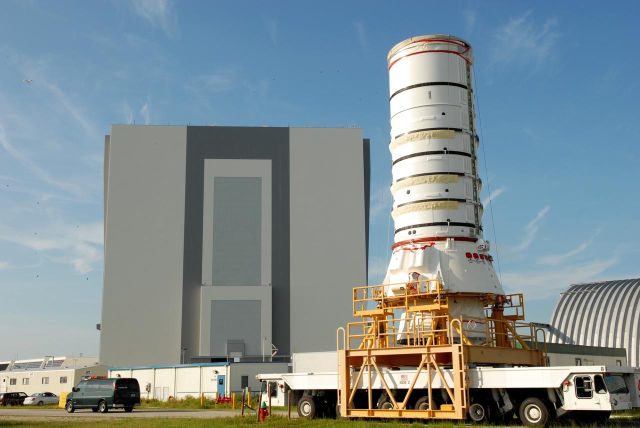CAPE CANAVERAL, Fla. – The Ares I-X aft assembly nears the Vehicle Assembly Building at NASA's Kennedy Space Center in Florida. It is being moved to the VAB for stacking to complete the Ares I-X test vehicle. The aft assembly will be the first segment to be stacked on the mobile launch platform in the VAB. Part of the Constellation Program, the Ares I-X is the test vehicle for the Ares I, which is the essential core of a space transportation system that eventually will carry crewed missions back to the moon, on to Mars and out into the solar system. The Ares I-X flight test is targeted no earlier than Aug. 30 from Launch Pad 39B. Photo credit: NASA/Jim Grossmann