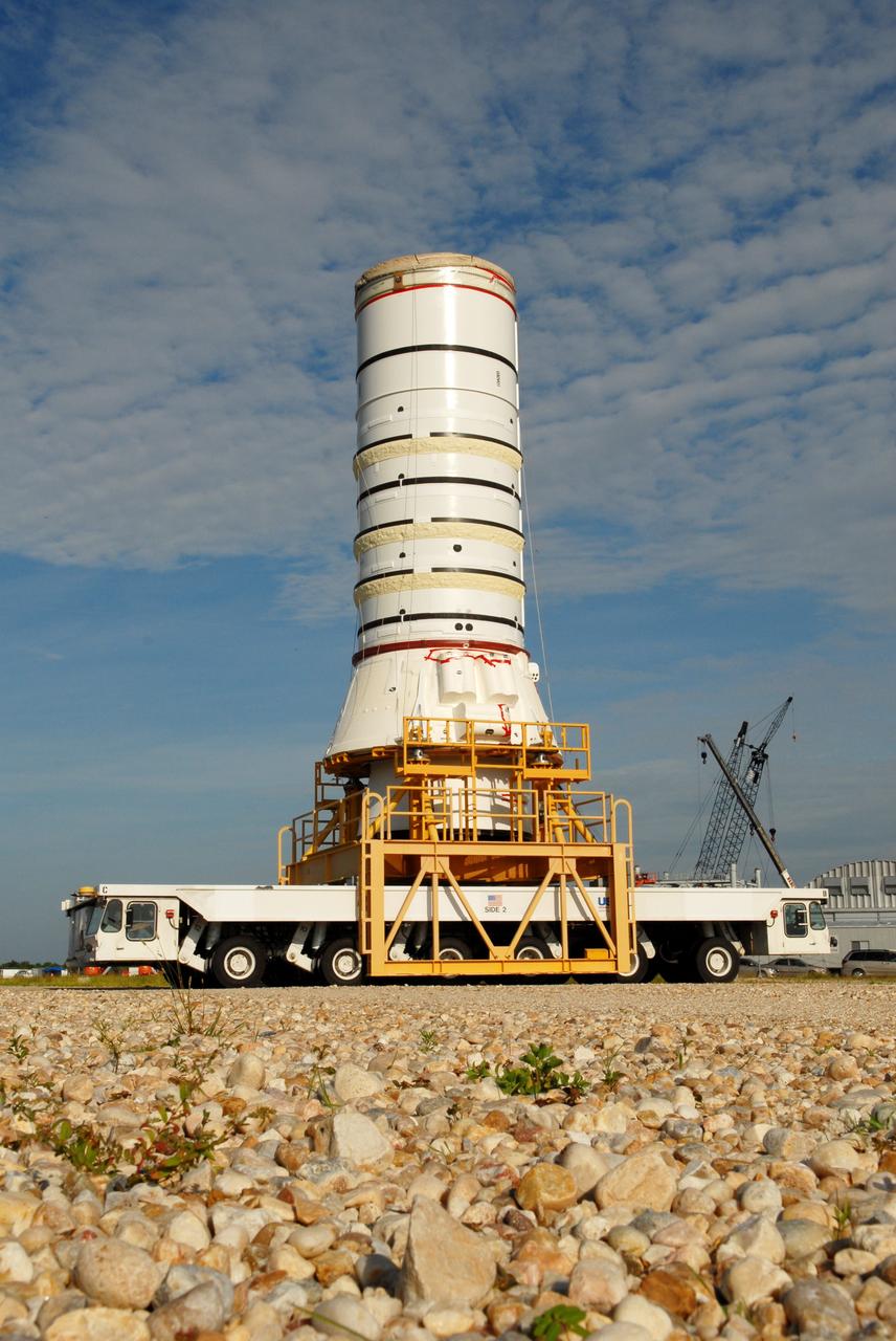 CAPE CANAVERAL, Fla. – The Ares I-X aft assembly is being moved to the Vehicle Assembly Building at NASA's Kennedy Space Center in Florida. There it will be stacked with other segments to complete the Ares I-X test vehicle. The aft assembly will be the first segment to be stacked on the mobile launch platform in the VAB. Part of the Constellation Program, the Ares I-X is the test vehicle for the Ares I, which is the essential core of a space transportation system that eventually will carry crewed missions back to the moon, on to Mars and out into the solar system. The Ares I-X flight test is targeted no earlier than Aug. 30 from Launch Pad 39B. Photo credit: NASA/Jim Grossmann