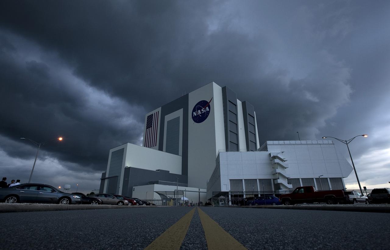 CAPE CANAVERAL, Fla. – Storm clouds roll in over the NASA Vehicle Assembly Building moments after STS-127 Space Shuttle Launch Director Pete Nickolenko and the launch team called the launch a "No Go" due to weather conditions at the NASA Kennedy Space Center in Cape Canaveral, Fla. Endeavour will be launching with the crew of STS-127 on a 16-day mission that will feature five spacewalks and complete construction of the Japan Aerospace Exploration Agency's Kibo laboratory. Endeavour will deliver the Japanese Experiment Module's Exposed Facility, or JEM-EF, and the Experiment Logistics Module-Exposed Section, or ELM-ES, in the final of three flights dedicated to the assembly of the Japan Aerospace Exploration Agency's Kibo laboratory complex on the International Space Station. STS-127 is the 29th flight for the assembly of the space station. Photo credit: NASA/Bill Ingalls