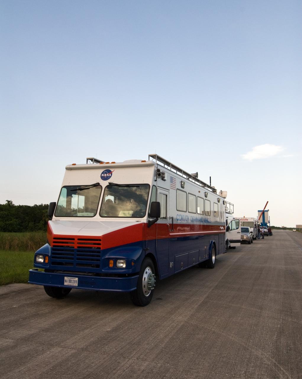 CAPE CANAVERAL, Fla. – The convoy command and SCAPE vehicles are in position at the Shuttle Landing Facility at NASA's Kennedy Space Center in Florida in the event of a return-to-landing-site is needed after launch of space shuttle Endeavour on the STS-127 mission. This is the fourth launch attempt for the STS-127 mission. The first two launch attempts on June 13 and June 17 were scrubbed when a hydrogen gas leak occurred during tanking due to a misaligned Ground Umbilical Carrier Plate. Mission managers also decided to delay tanking on July 11 for a launch attempt later in the day to allow engineers and safety personnel time to analyze data captured during lightning strikes near the pad on July 10. Endeavour will deliver the Japanese Experiment Module's Exposed Facility, or JEM-EF, and the Experiment Logistics Module-Exposed Section, or ELM-ES, in the final of three flights dedicated to the assembly of the Japan Aerospace Exploration Agency's Kibo laboratory complex on the International Space Station.  STS-127 is the 29th flight for the assembly of the space.   Photo credit: NASA/Jack Pfaller