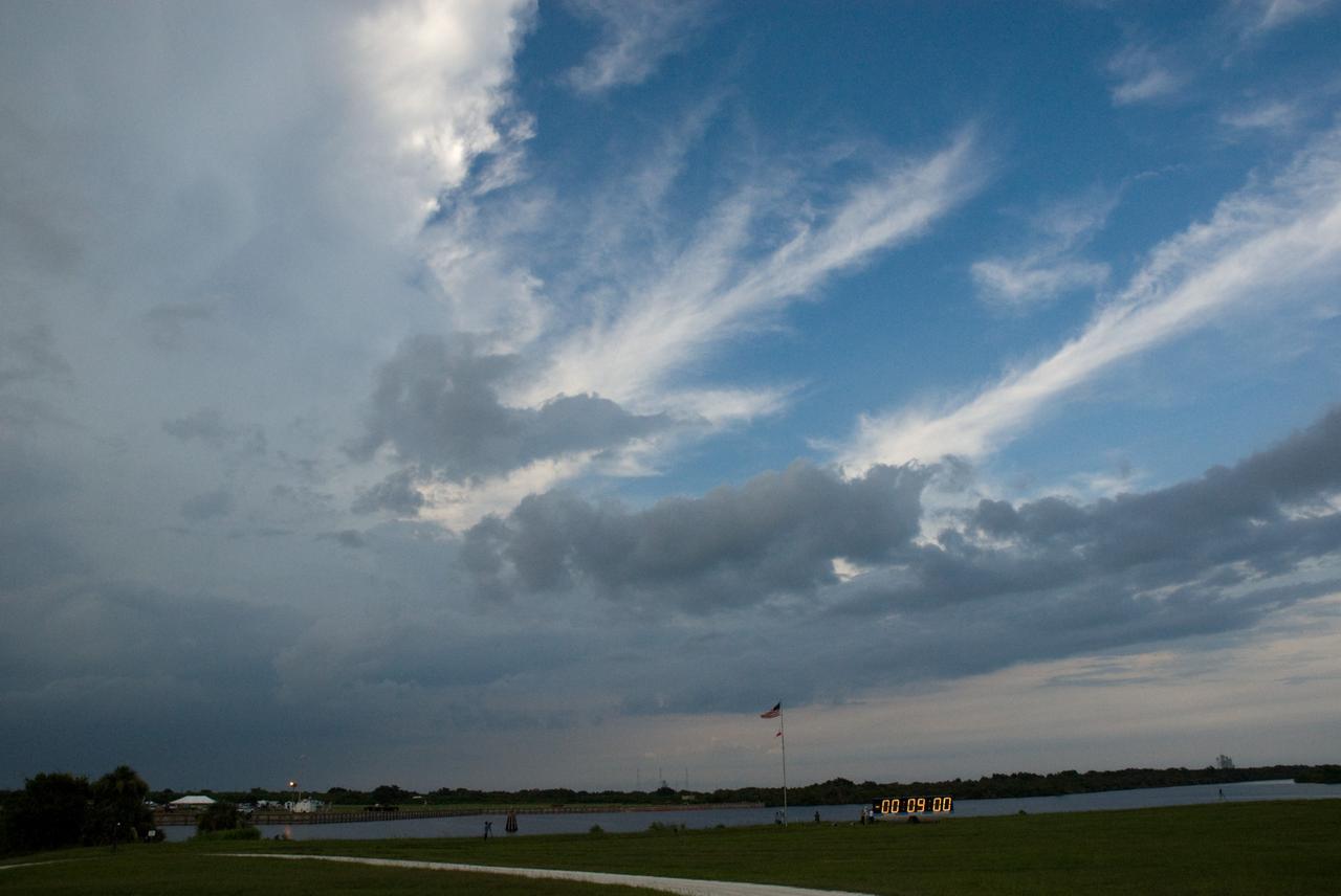 CAPE CANAVERAL, Fla. – Ominous clouds roll toward Launch Pad 39A at NASA's Kennedy Space Center in Florida.  NASA managers postponed today’s space shuttle launch because of lightning and thunderstorms within the 20-nautical-mile circle around the launch pad. The fifth launch attempt for the STS-127 mission was scrubbed at 6:39 p.m. EDT. The first two launch attempts on June 13 and June 17 were scrubbed when a hydrogen gas leak occurred during tanking due to a misaligned Ground Umbilical Carrier Plate. Mission managers also decided to delay tanking on July 11 for a launch attempt later in the day to allow engineers and safety personnel time to analyze data captured during lightning strikes near the pad on July 10. Weather concerns caused a scrub July 12 as well. Endeavour will deliver the Japanese Experiment Module's Exposed Facility, or JEM-EF, and the Experiment Logistics Module-Exposed Section, or ELM-ES, in the final of three flights dedicated to the assembly of the Japan Aerospace Exploration Agency's Kibo laboratory complex on the International Space Station.  STS-127 is the 29th flight for the assembly of the space.    Photo credit: NASA/Tim Jacobs