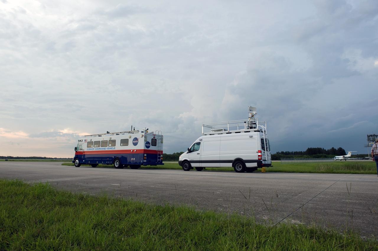 CAPE CANAVERAL, Fla. – The convoy command and SCAPE vehicles are in position at the Shuttle Landing Facility at NASA's Kennedy Space Center in Florida in the event of a return-to-landing-site is needed after launch of space shuttle Endeavour on the STS-127 mission. This is the fifth launch attempt for the STS-127 mission. The first two launch attempts on June 13 and June 17 were scrubbed when a hydrogen gas leak occurred during tanking due to a misaligned Ground Umbilical Carrier Plate. Mission managers also decided to delay tanking on July 11 for a launch attempt later in the day to allow engineers and safety personnel time to analyze data captured during lightning strikes near the pad on July 10. The fourth attempt on July 12 was scrubbed due to weather concerns as well. Photo credit: NASA/Carl Winebarger