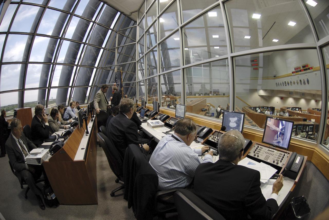 CAPE CANAVERAL, Fla. – At NASA's Kennedy Space Center in Florida, the STS-127 mission team consider the need to postpone the launch of space shuttle Endeavour because of lightning and thunderstorms within the 20-nautical-mile circle around the launch pad. The fifth launch attempt for the STS-127 mission was scrubbed at 6:39 p.m. EDT. The STS-127 launch was rescheduled for July 15 at 6:03 p.m. EDT. Endeavour will deliver the Japanese Experiment Module's Exposed Facility, or JEM-EF, and the Experiment Logistics Module-Exposed Section, or ELM-ES, in the final of three flights dedicated to the assembly of the Japan Aerospace Exploration Agency's Kibo laboratory complex on the International Space Station.  STS-127 is the 29th flight for the assembly of the space Photo credit: NASA/Kim Shiflett