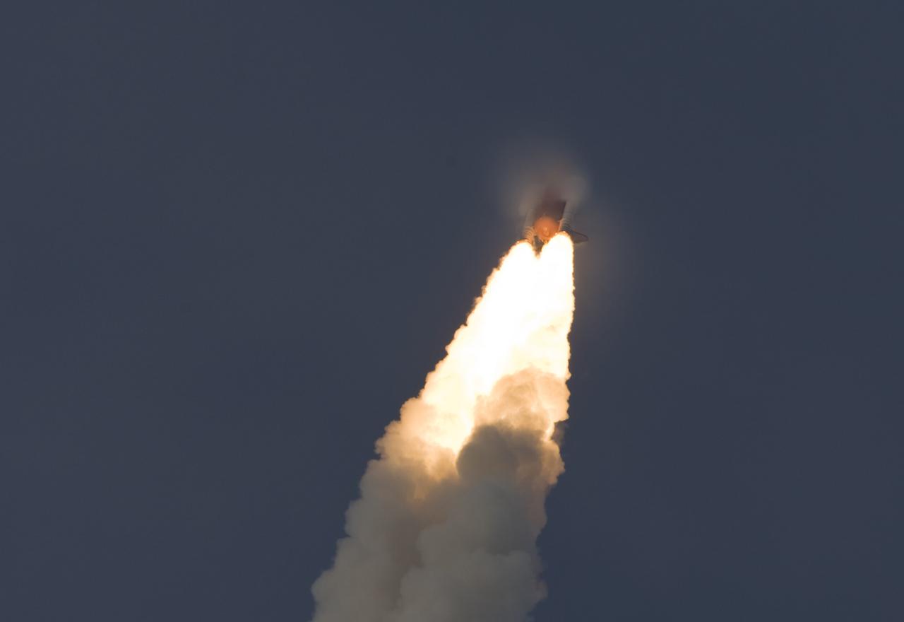 CAPE CANAVERAL, Fla. – Trailed by a column of fiery smoke, space shuttle Endeavour hurtles toward space from NASA Kennedy Space Center's Launch Pad 39A  on the STS-127 mission.  Liftoff was on-time at 6:03 p.m. EDT. Today was the sixth launch attempt for the STS-127 mission.  The launch was scrubbed on June 13 and June 17 when a hydrogen gas leak occurred during tanking due to a misaligned Ground Umbilical Carrier Plate.  The mission was postponed July 11, 12 and 13 due to weather conditions near the Shuttle Landing Facility at Kennedy that violated rules for launching, and lightning issues. Endeavour will deliver the Japanese Experiment Module's Exposed Facility and the Experiment Logistics Module-Exposed Section in the final of three flights dedicated to the assembly of the Japan Aerospace Exploration Agency's Kibo laboratory complex on the International Space Station.   Photo courtesy of Scott Andrews
