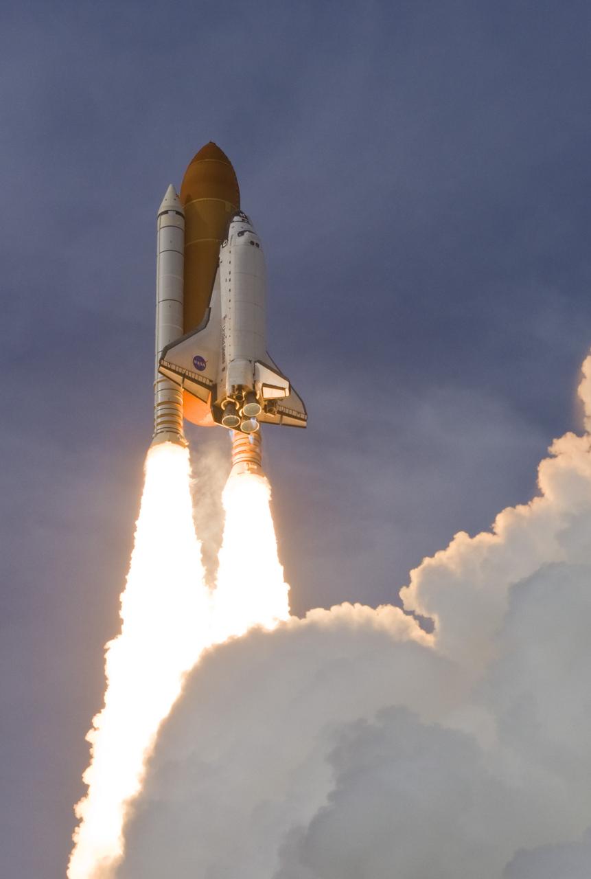 CAPE CANAVERAL, Fla. – Propelled by columns of fire, space shuttle Endeavour hurtles into the cloud-washed sky from NASA Kennedy Space Center's Launch Pad 39A on the STS-127 mission. Liftoff was on-time at 6:03 p.m. EDT. This was the sixth launch attempt for the STS-127 mission.  The launch was scrubbed on June 13 and June 17 when a hydrogen gas leak occurred during tanking due to a misaligned Ground Umbilical Carrier Plate.  The mission was postponed July 11, 12 and 13 due to weather conditions near the Shuttle Landing Facility at Kennedy that violated rules for launching, and lightning issues. Endeavour will deliver the Japanese Experiment Module's Exposed Facility and the Experiment Logistics Module-Exposed Section in the final of three flights dedicated to the assembly of the Japan Aerospace Exploration Agency's Kibo laboratory complex on the International Space Station.   Photo courtesy of Scott Andrews