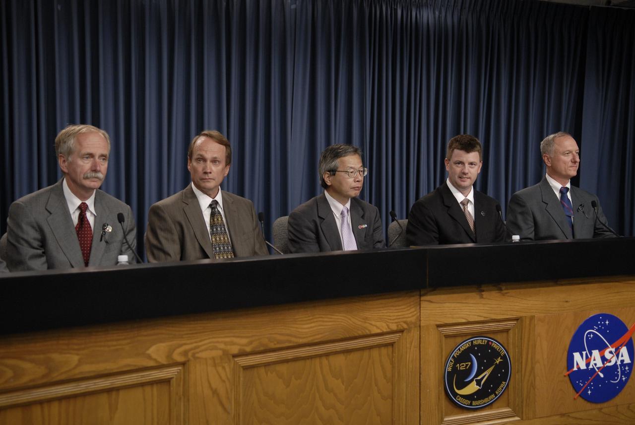 CAPE CANAVERAL, Fla. –  At NASA's Kennedy Space Center in Florida, a press conference following the successful launch of space shuttle Endeavour on the STS-127 mission featured (from left) Associate Administrator for NASA's Space Operations Directorate William  Gerstenmaier, Canadian Space Agency President Steve MacLean, Japan Aerospace Exploration Agency Executive Director of Human Space Systems and Utilization Kuniaki Shiraki, Shuttle Launch Integration Manager Mike Moses and STS-127 Shuttle Launch Director Pete Nickolenko.  This was the sixth launch attempt for the STS-127 mission.  The launch was scrubbed on June 13 and June 17 when a hydrogen gas leak occurred during tanking due to a misaligned Ground Umbilical Carrier Plate.  The mission was postponed July 11, 12 and 13 due to weather conditions near the Shuttle Landing Facility at Kennedy that violated rules for launching, and lightning issues. Endeavour will deliver the Japanese Experiment Module's Exposed Facility and the Experiment Logistics Module-Exposed Section in the final of three flights dedicated to the assembly of the Japan Aerospace Exploration Agency's Kibo laboratory complex on the International Space Station.   Photo credit: NASA/Kim Shiflett