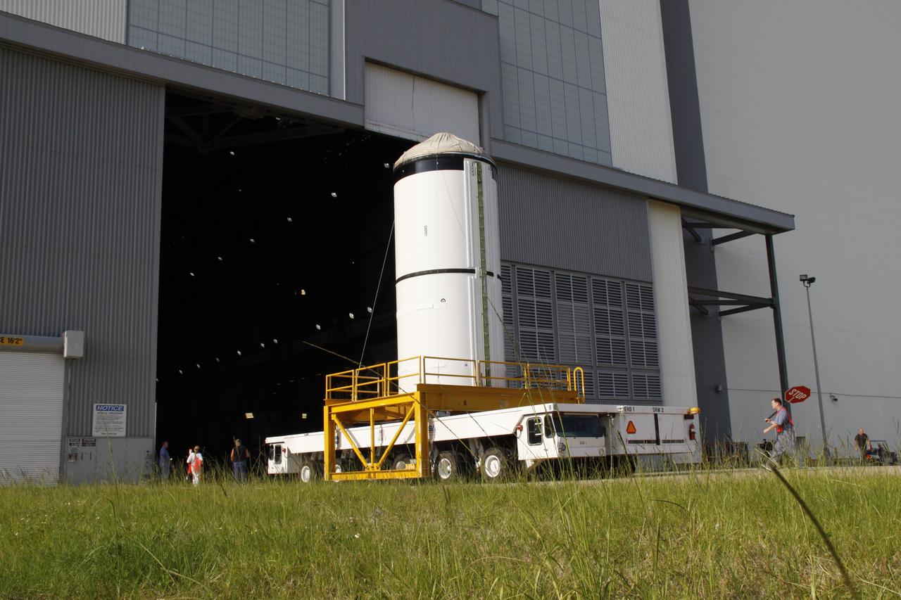 CAPE CANAVERAL, Fla. – The Ares I-X forward segment enters the Vehicle Assembly Building at NASA's Kennedy Space Center in Florida. It will be mated with the aft center and aft segments already stacked. Part of the Constellation Program, the Ares I-X is the test vehicle for the Ares I, which is the essential core of a space transportation system that eventually will carry crewed missions back to the moon, on to Mars and out into the solar system . The Ares I-X flight test is targeted for no earlier than Aug. 30. Photo credit: NASA/Troy Cryder