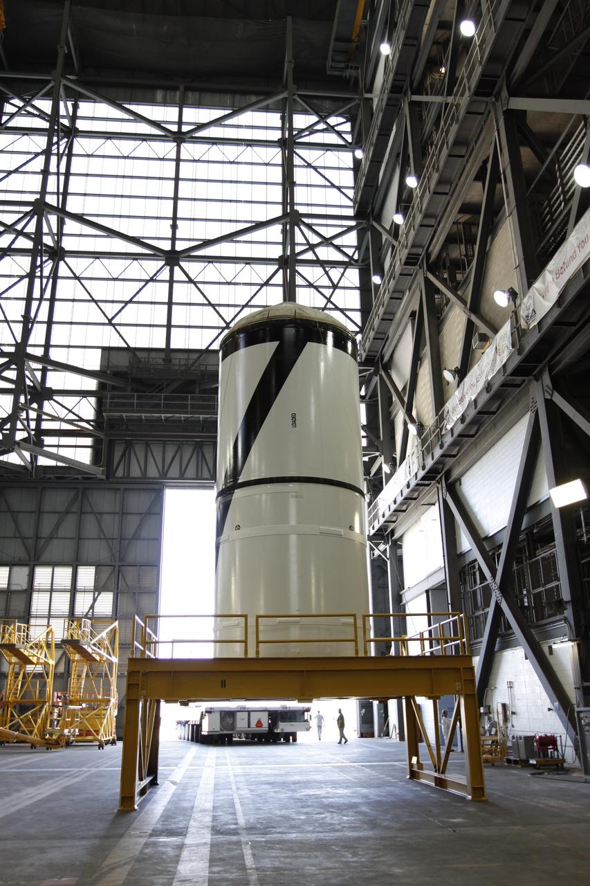 CAPE CANAVERAL, Fla. – The Ares I-X forward segment is in the transfer aisle of the Vehicle Assembly Building at NASA's Kennedy Space Center in Florida. It will be mated with the aft center and aft segments already stacked. Part of the Constellation Program, the Ares I-X is the test vehicle for the Ares I, which is the essential core of a space transportation system that eventually will carry crewed missions back to the moon, on to Mars and out into the solar system . The Ares I-X flight test is targeted for no earlier than Aug. 30. Photo credit: NASA/Troy Cryder