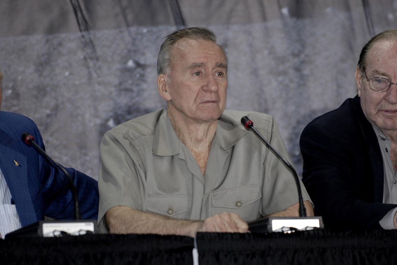 CAPE CANAVERAL, Fla. – At the Apollo/Saturn V Center at NASA's Kennedy Space Center in Florida, Apollo astronaut Walt Cunningham shares his experiences with an eager crowd gathered for NASA's 40th Anniversary of Apollo Celebration of the July 1969 launch and landing on the moon. Cunningham occupied the lunar module pilot seat for the 11-day flight of Apollo 7--the first manned flight test of the third-generation United States spacecraft. Photo credit: NASA/Kim Shiflett