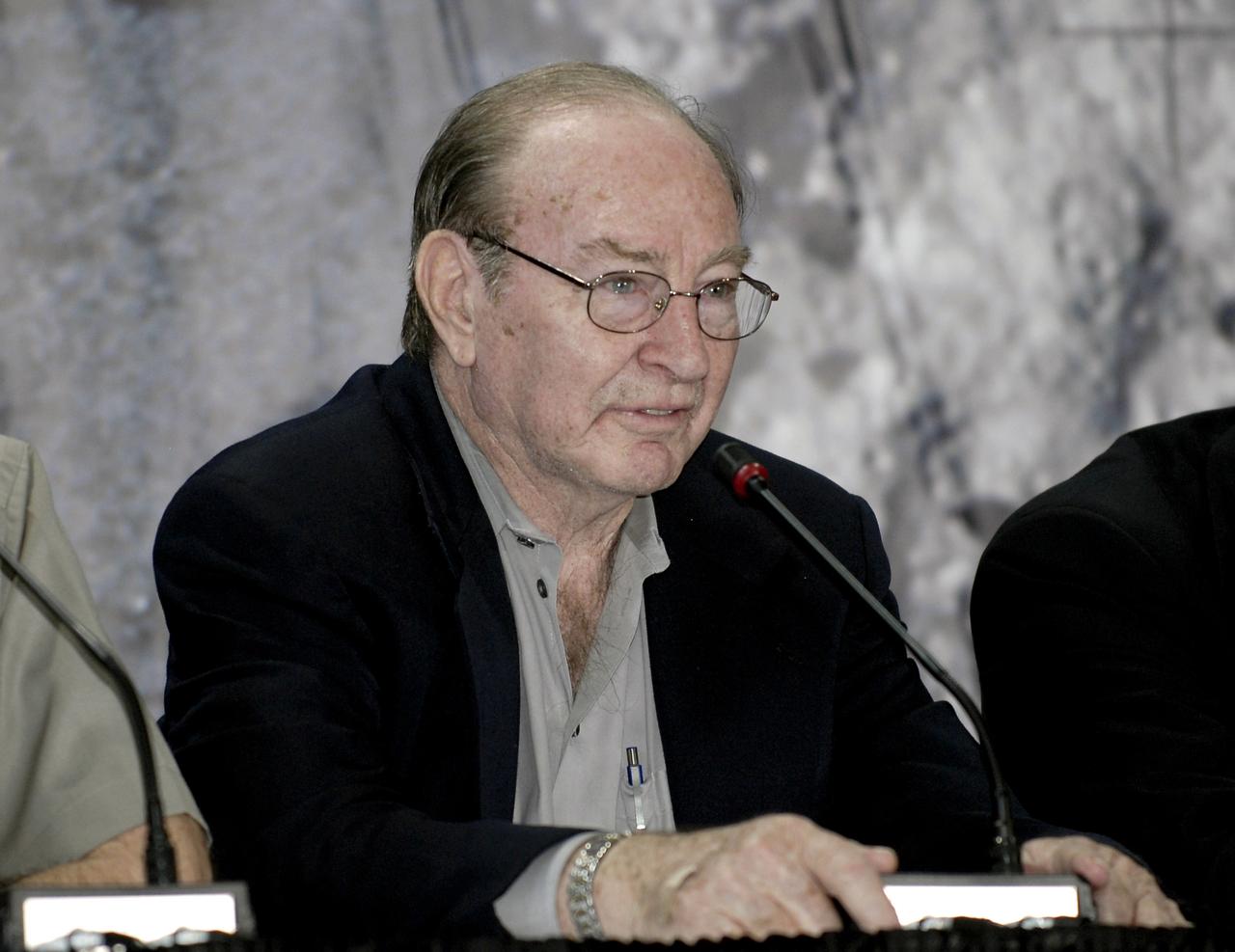 CAPE CANAVERAL, Fla. – At the Apollo/Saturn V Center at NASA's Kennedy Space Center in Florida, Apollo astronaut Edgar Mitchell shares his experiences with an eager crowd gathered for NASA's 40th Anniversary of Apollo Celebration of the July 1969 launch and landing on the moon. Mitchell walked on the moon on the Apollo 14 mission in 1971 and was backup lunar module pilot for Apollo 16. Photo credit: NASA/Kim Shiflett