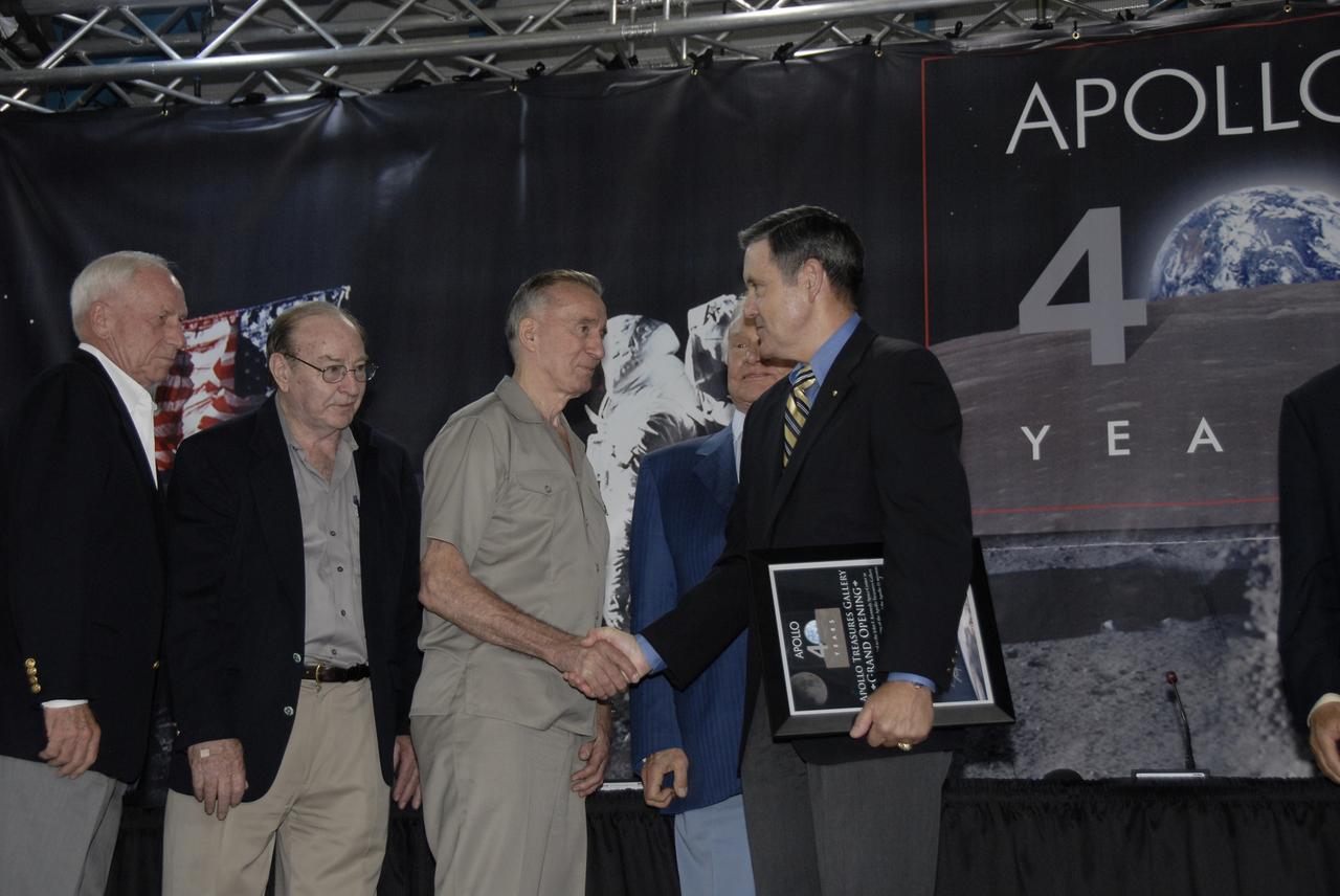 CAPE CANAVERAL, Fla. – Closing NASA's 40th Anniversary of Apollo Celebration at the Apollo/Saturn V Center at NASA's Kennedy Space Center in Florida, Center Director Bob Cabana thanks the Apollo astronauts who participated. Seen here (from left) are Al Worden, Edgar Mitchell, Walt Cunningham and Buzz Aldrin. The celebration honored the July 1969 launch and landing on the moon. Photo credit: NASA/Kim Shiflett