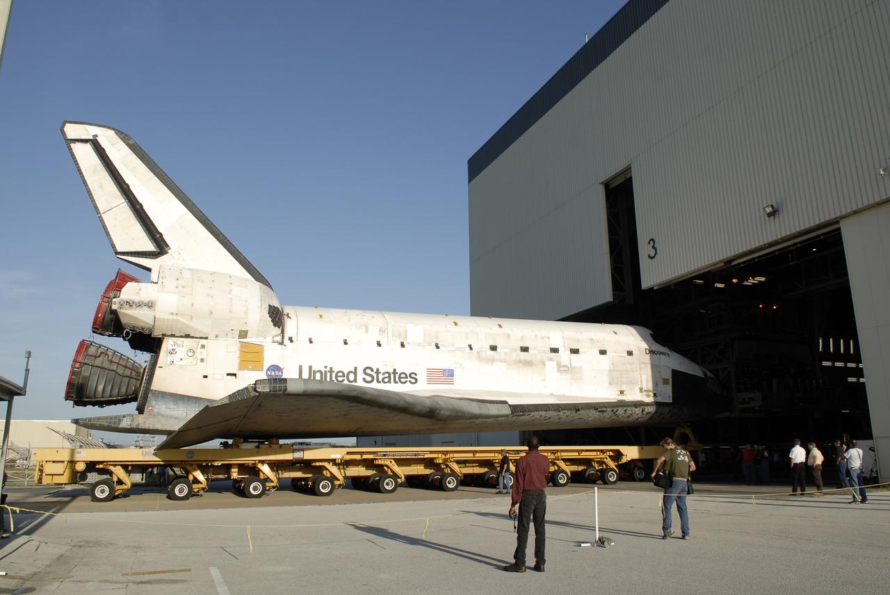 CAPE CANAVERAL, Fla. – Space shuttle Discovery rolls out of Orbiter Processing Facility 3 to the Vehicle Assembly Building at NASA's Kennedy Space Center, Fla. The first motion of the shuttle out of its hangar was at 7:22 a.m. EDT. In the VAB, Discovery will be lifted into High Bay 1 and mated to the external fuel tank and solid rocket boosters already installed on the mobile launcher platform. The shuttle is scheduled to roll out to Launch Pad 39A the first week of August to prepare for the STS-128 mission to the International Space Station. Discovery will carry the Leonardo Multi-Purpose Logistics Module containing life support racks and science racks and the Lightweight Multi-Purpose Experiment Support Structure Carrier in its payload bay. Launch of Discovery is targeted for late August. Photo credit: NASA/Kim Shiflett