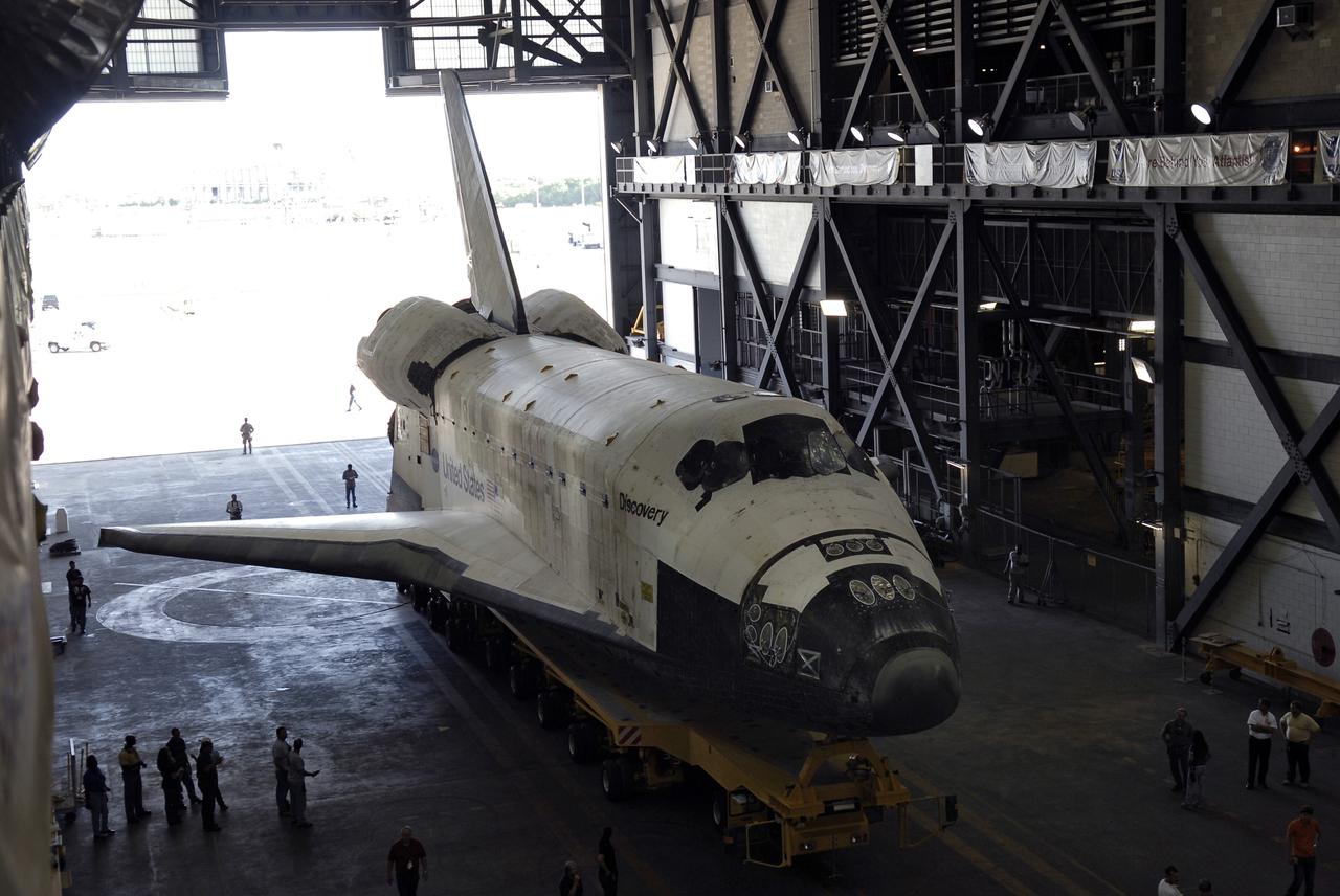 CAPE CANAVERAL, Fla. – Space shuttle Discovery rolls into the Vehicle Assembly Building at NASA's Kennedy Space Center, Fla. The first motion of the shuttle out Orbiter Processing Facility 3 was at 7:22 a.m. EDT. In the VAB, Discovery will be lifted into High Bay 1 and mated to the external fuel tank and solid rocket boosters already installed on the mobile launcher platform. The shuttle is scheduled to roll out to Launch Pad 39A the first week of August to prepare for the STS-128 mission to the International Space Station. Discovery will carry the Leonardo Multi-Purpose Logistics Module containing life support racks and science racks and the Lightweight Multi-Purpose Experiment Support Structure Carrier in its payload bay. Launch of Discovery is targeted for late August. Photo credit: NASA/Kim Shiflett
