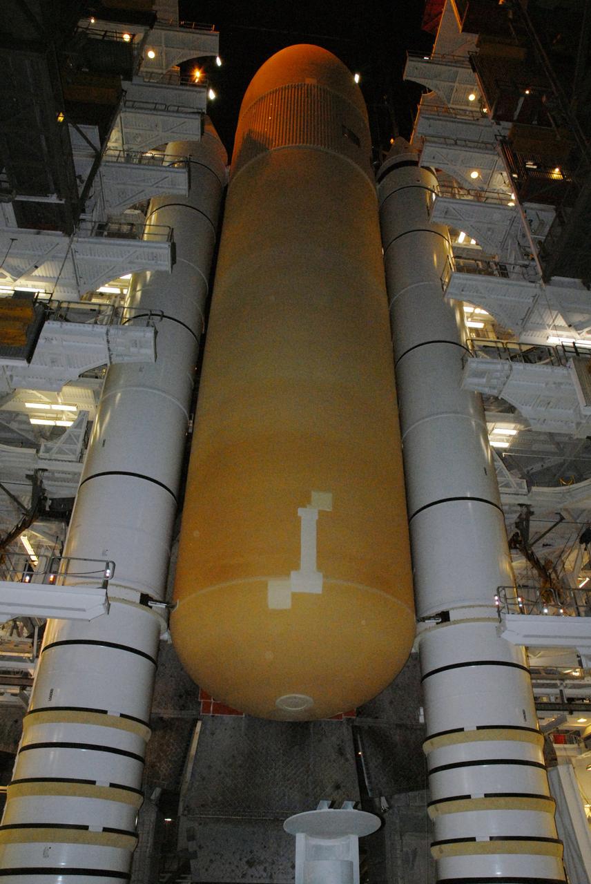 CAPE CANAVERAL, Fla. – In High Bay 1 of the Vehicle Assembly Building at NASA's Kennedy Space Center in Florida, the solid rocket boosters flank the external fuel tank that will be attached to space shuttle Discovery.  The SRBs and external tank are already stacked on the mobile launcher platform.  Discovery is scheduled to roll out to Launch Pad 39A the first week of August to prepare for the STS-128 mission to the International Space Station.  The shuttle will carry the Leonardo Multi-Purpose Logistics Module containing life support racks and science racks and the Lightweight Multi-Purpose Experiment Support Structure Carrier in its payload bay.  Launch of Discovery is targeted for late August.  Photo credit: NASA/Ben Smegelsky