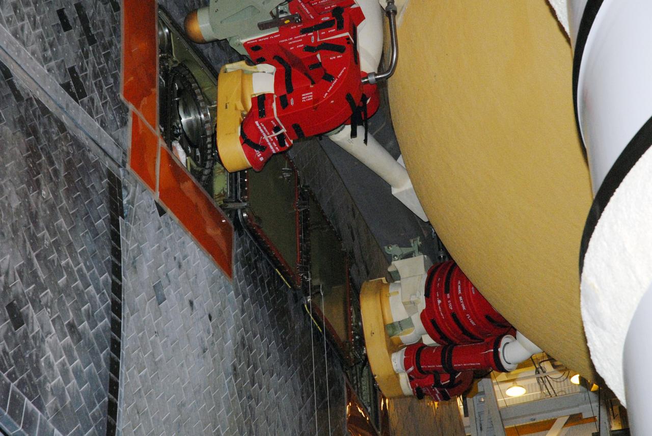 CAPE CANAVERAL, Fla. – In High Bay 1 of the Vehicle Assembly Building at NASA's Kennedy Space Center in Florida, the external fuel tank is in position to be attached to space shuttle Discovery on the mobile launcher platform.  Discovery is scheduled to roll out to Launch Pad 39A the first week of August to prepare for the STS-128 mission to the International Space Station.  The shuttle will carry the Leonardo Multi-Purpose Logistics Module containing life support racks and science racks and the Lightweight Multi-Purpose Experiment Support Structure Carrier in its payload bay.  Launch of Discovery is targeted for late August.  Photo credit: NASA/Ben Smegelsky