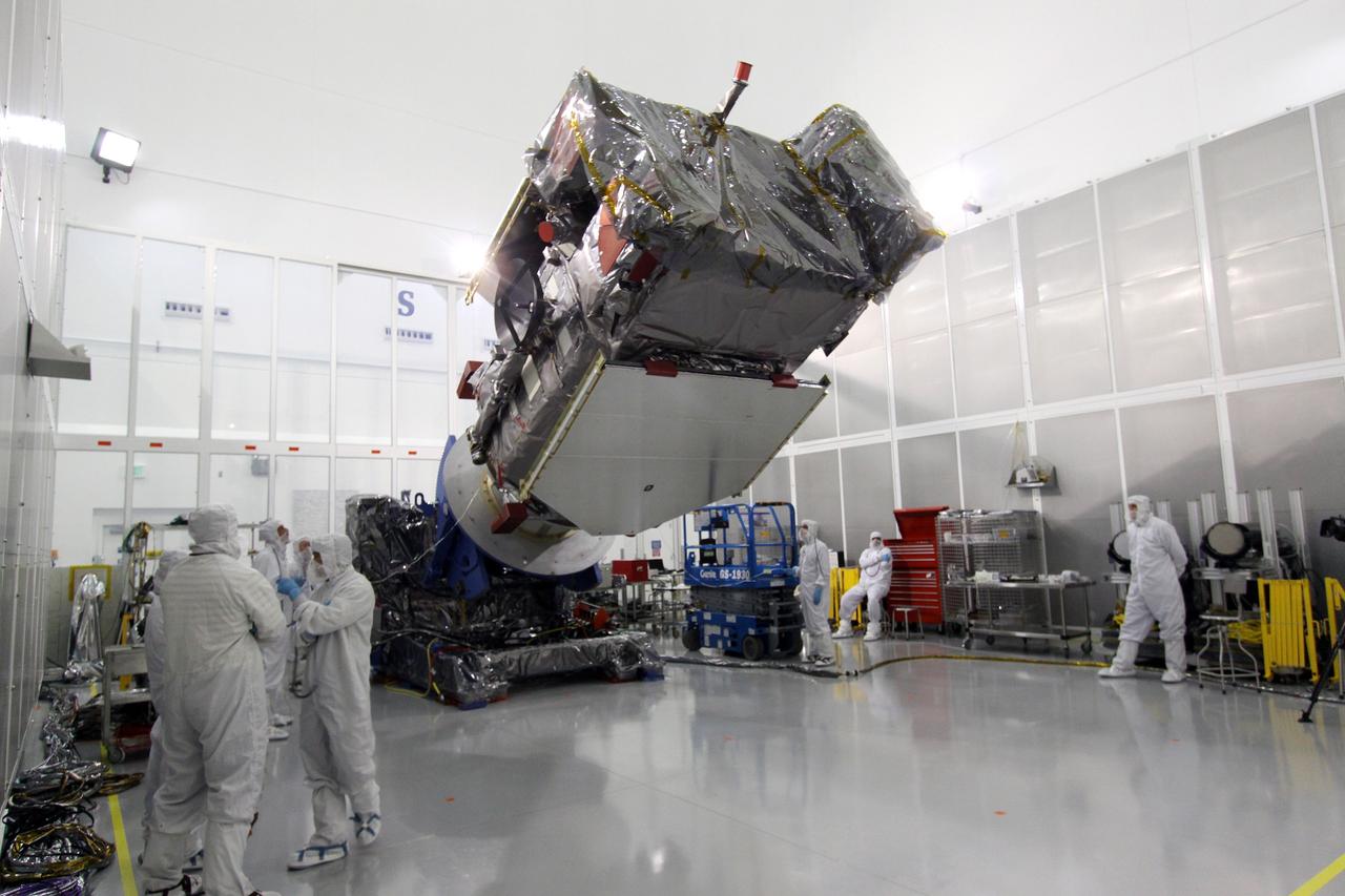 CAPE CANAVERAL, Fla. – At the Astrotech Payload Processing Facility in Titusville, Fla.,  the Solar Dynamics Observatory is  rotated on a Ransome table.  The rotation will allow access to different areas of the spacecraft. SDO is the first space weather research network mission in NASA's Living With a Star Program.  The spacecraft's long-term measurements will give solar scientists in-depth information about changes in the sun's magnetic field and insight into how they affect Earth.  In preparation for its anticipated November launch, engineers will perform a battery of comprehensive tests to ensure SDO can withstand the stresses and vibrations of the launch itself, as well as what it will encounter in the space environment after launch.  Photo credit: NASA/Jack Pfaller