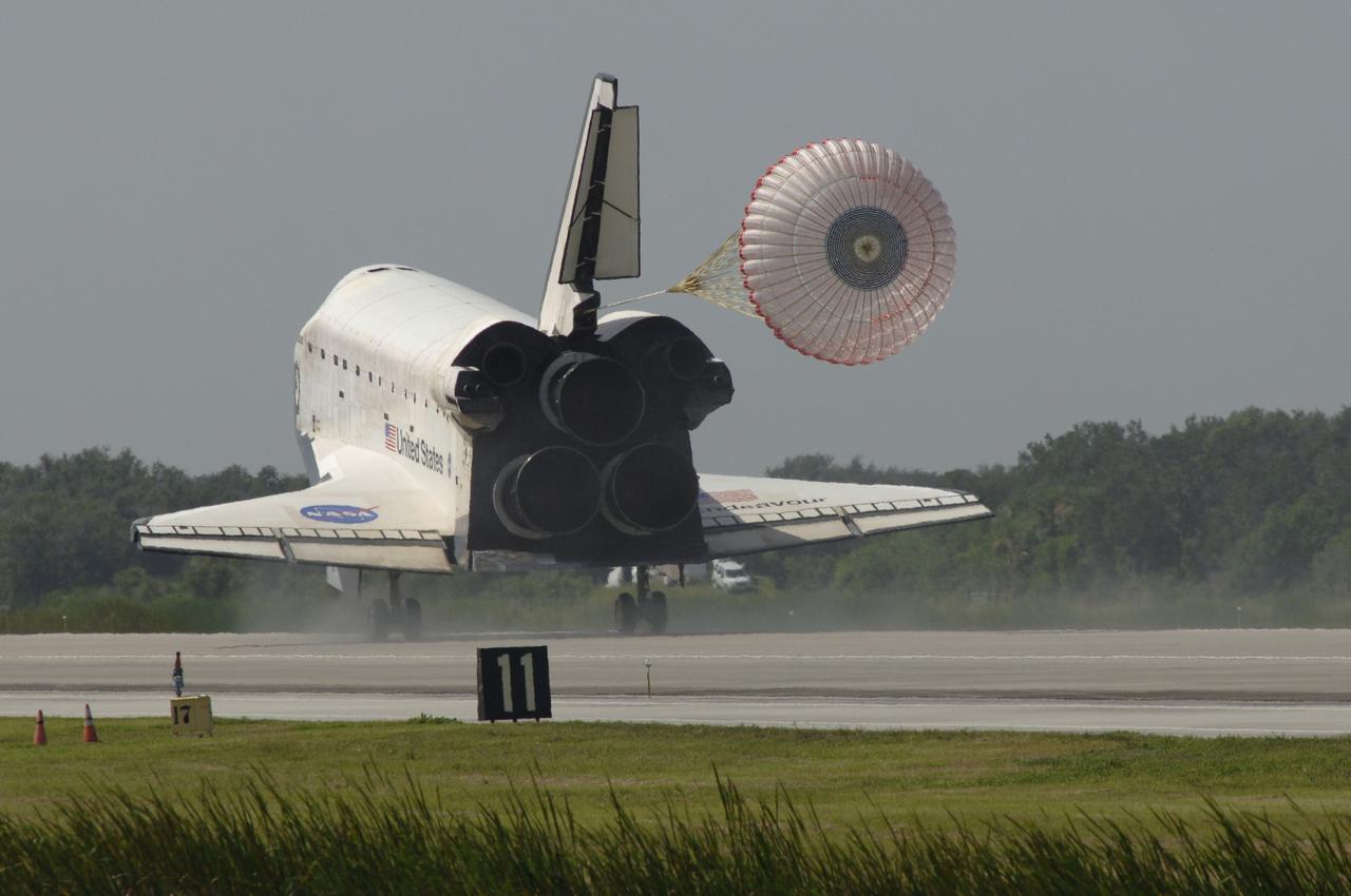 CAPE CANAVERAL, Fla. – The drogue chute unfurls behind space shuttle Endeavour on Runway 15 at NASA's Kennedy Space Center in Florida to complete the 16-day, 6.5-million mile journey on the STS-127 mission to the International Space Station. Endeavour landed on orbit 248. Main gear touchdown was at 10:48:08 a.m. EDT. Nose gear touchdown was at 10:48:21 a.m. and wheels stop was at 10:49:13 a.m. Endeavour delivered the Japanese Experiment Module's Exposed Facility and the Experiment Logistics Module-Exposed Section to the International Space Station. The mission was the 29th flight to the station, the 23rd flight of Endeavour and the 127th in the Space Shuttle Program, as well as the 71st landing at Kennedy. Photo credit: NASA/Kim Shiflett