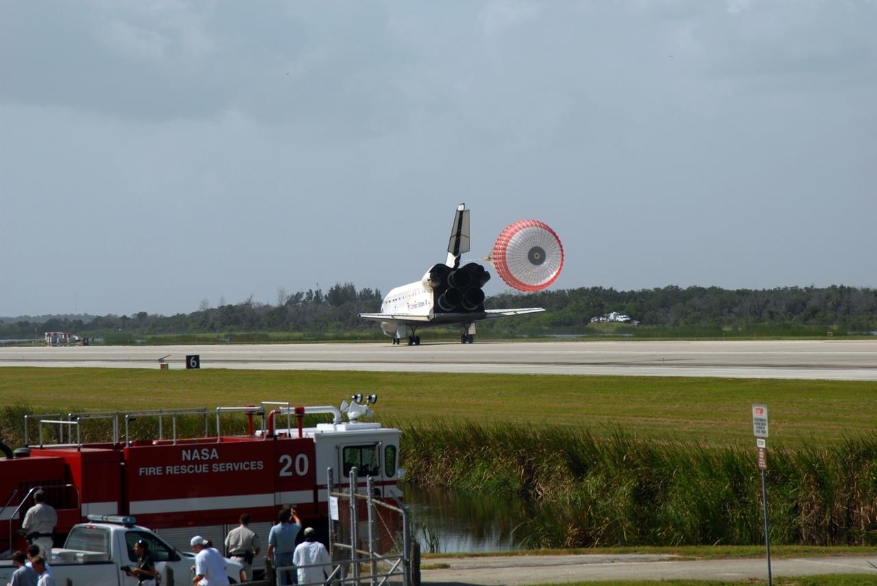 CAPE CANAVERAL, Fla. – The drogue chute slows space shuttle Endeavour on Runway 15 at NASA's Kennedy Space Center in Florida to complete the 16-day, 6.5-million mile journey on the STS-127 mission to the International Space Station. Endeavour landed on orbit 248. Main gear touchdown was at 10:48:08 a.m. EDT. Nose gear touchdown was at 10:48:21 a.m. and wheels stop was at 10:49:13 a.m. Endeavour delivered the Japanese Experiment Module's Exposed Facility and the Experiment Logistics Module-Exposed Section to the International Space Station. The mission was the 29th flight to the station, the 23rd flight of Endeavour and the 127th in the Space Shuttle Program, as well as the 71st landing at Kennedy. Photo credit: NASA/Jim Grossmann