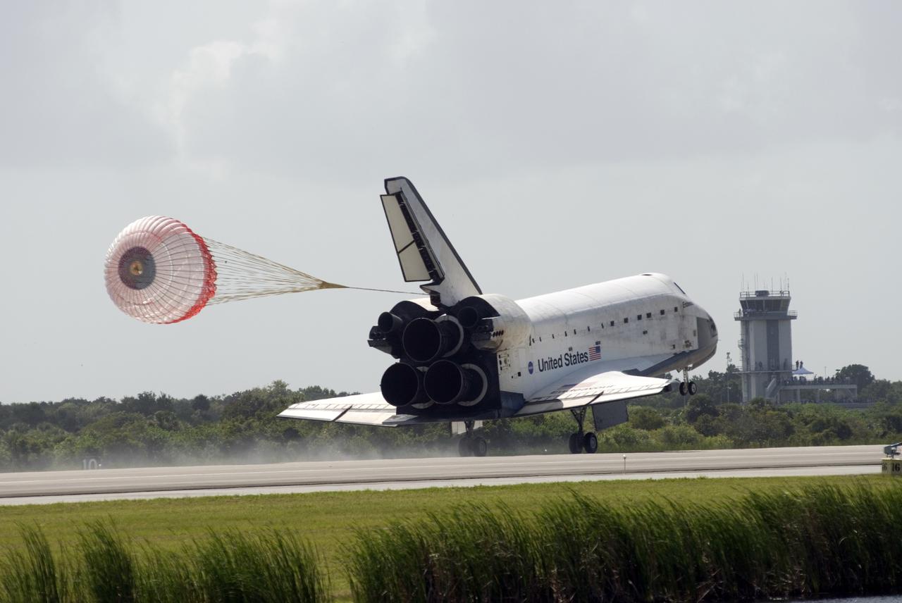 CAPE CANAVERAL, Fla. –  The drogue chute slows space shuttle Endeavour on Runway 15 at NASA's Kennedy Space Center in Florida to complete the 16-day, 6.5-million mile journey on the STS-127 mission to the International Space Station. Endeavour landed on orbit 248.  Main gear touchdown was at 10:48:08 a.m. EDT. Nose gear touchdown was at 10:48:21 a.m. and wheels stop was at 10:49:13 a.m. Endeavour delivered the Japanese Experiment Module's Exposed Facility and the Experiment Logistics Module-Exposed Section to the International Space Station. The mission was the 29th flight to the station, the 23rd flight of Endeavour and the 127th in the Space Shuttle Program, as well as the 71st landing at Kennedy.  Photo credit: NASA/Tom Joseph
