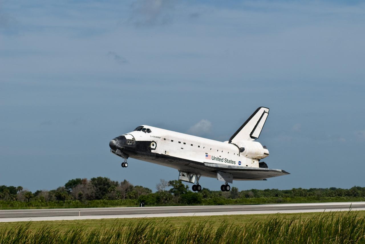 CAPE CANAVERAL, Fla. –  With landing gear down, space shuttle Endeavour approaches landing on Runway 15 at NASA's Kennedy Space Center in Florida to complete the 16-day, 6.5-million mile journey on the STS-127 mission to the International Space Station. Endeavour landed on orbit 248.  Main gear touchdown was at 10:48:08 a.m. EDT. Nose gear touchdown was at 10:48:21 a.m. and wheels stop was at 10:49:13 a.m. Endeavour delivered the Japanese Experiment Module's Exposed Facility and the Experiment Logistics Module-Exposed Section to the International Space Station. The mission was the 29th flight to the station, the 23rd flight of Endeavour and the 127th in the Space Shuttle Program, as well as the 71st landing at Kennedy.  Photo credit: NASA/Linda Perry