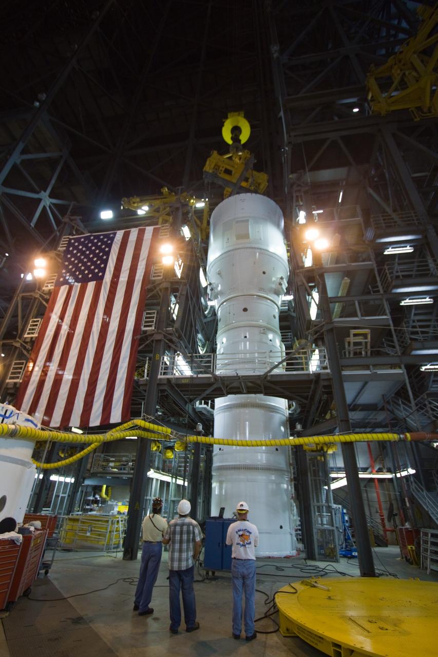 CAPE CANAVERAL, Fla. –  In the Vehicle Assembly Building's High Bay 4, the Ares I-X "super stack 1" is to be lifted into High Bay 3 and attached to the forward motor segment. Super stack 1 comprises the frustum, forward skirt, forward skirt extension, interstages 1 and 2 and the fifth segment simulator. Ares I-X is the test vehicle for the Ares I, which is part of the Constellation Program to return men to the moon and beyond. The Ares I-X flight test is targeted for  Oct. 31, pending forma NASA Headquarters approval. Photo credit: NASA/Jack Pfaller