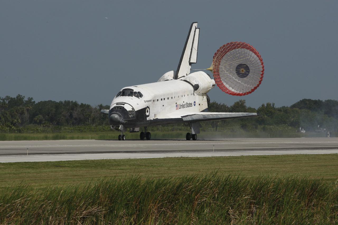 CAPE CANAVERAL, Fla. – The unfurled drogue chute slows space shuttle Endeavour as it lands on Runway 15 at NASA's Kennedy Space Center in Florida to complete the 16-day, 6.5-million mile journey on the STS-127 mission to the International Space Station. Endeavour landed on orbit 248. Main gear touchdown was at 10:48:08 a.m. EDT. Nose gear touchdown was at 10:48:21 a.m. and wheels stop was at 10:49:13 a.m. Endeavour delivered the Japanese Experiment Module's Exposed Facility and the Experiment Logistics Module-Exposed Section to the International Space Station. The mission was the 29th flight to the station, the 23rd flight of Endeavour and the 127th in the Space Shuttle Program, as well as the 71st landing at Kennedy. Photo courtesy of Scott Andrews