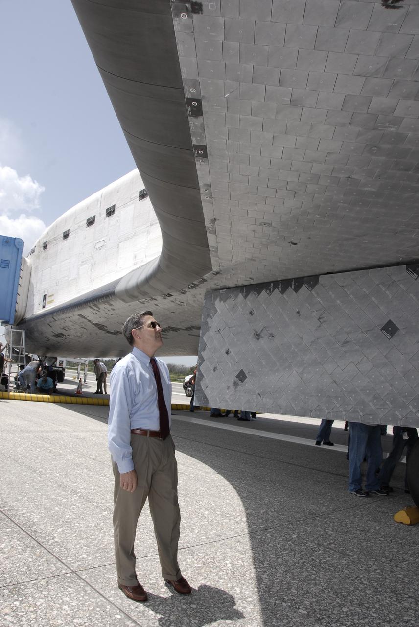 CAPE CANAVERAL, Fla. –  At NASA's Kennedy Space Center in Florida, Center Director Bob Cabana takes a close look at the tiles beneath space shuttle Endeavour after its landing that completed the 16-day, 6.5-million mile journey on the STS-127 mission to the International Space Station.  Main gear touchdown was at 10:48:08 a.m. EDT. Nose gear touchdown was at 10:48:21 a.m. and wheels stop was at 10:49:13 a.m. Endeavour delivered the Japanese Experiment Module's Exposed Facility and the Experiment Logistics Module-Exposed Section to the International Space Station. The mission was the 29th flight to the station, the 23rd flight of Endeavour and the 127th in the Space Shuttle Program, as well as the 71st landing at Kennedy.   Photo credit: NASA/Kim Shiflett