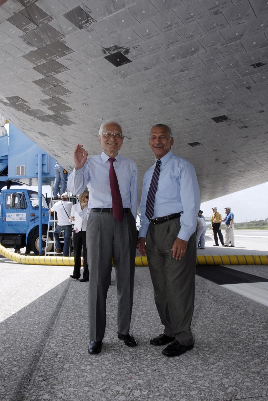 CAPE CANAVERAL, Fla. –  At NASA's Kennedy Space Center in Florida, president of the Japan Aerospace Exploration Agency Keiji Tachikawa (left) and NASA Administrator Charles Bolden look over space shuttle Endeavour after its landing that completed the 16-day, 6.5-million mile journey on the STS-127 mission to the International Space Station.  Main gear touchdown was at 10:48:08 a.m. EDT. Nose gear touchdown was at 10:48:21 a.m. and wheels stop was at 10:49:13 a.m. Endeavour delivered the Japanese Experiment Module's Exposed Facility and the Experiment Logistics Module-Exposed Section to the International Space Station. The mission was the 29th flight to the station, the 23rd flight of Endeavour and the 127th in the Space Shuttle Program, as well as the 71st landing at Kennedy.   Photo credit: NASA/Kim Shiflett