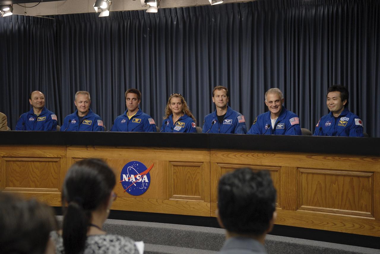 CAPE CANAVERAL, Fla. – At  NASA's Kennedy Space Center in Florida, the STS-127 crew members take part in a news conference following their return to Earth on space shuttle Endeavour after the 16-day mission to the International Space Station.  From left are Commander Mark Polansky, Pilot Doug Hurley, Mission Specialists Christopher Cassidy, Canadian Space Agency astronaut Julie Payette, Tom Marshburn and Dave Wolf, and Japan Aerospace Exploration Agency astronaut Koichi Wakata, who spent four months on the space station and returned on Endeavour. Endeavour delivered the Japanese Experiment Module's Exposed Facility and the Experiment Logistics Module-Exposed Section to the International Space Station. The mission was the 29th flight to the station, the 23rd flight of Endeavour and the 127th in the Space Shuttle Program, as well as the 71st landing at Kennedy.  Photo credit: NASA/Kim Shiflett