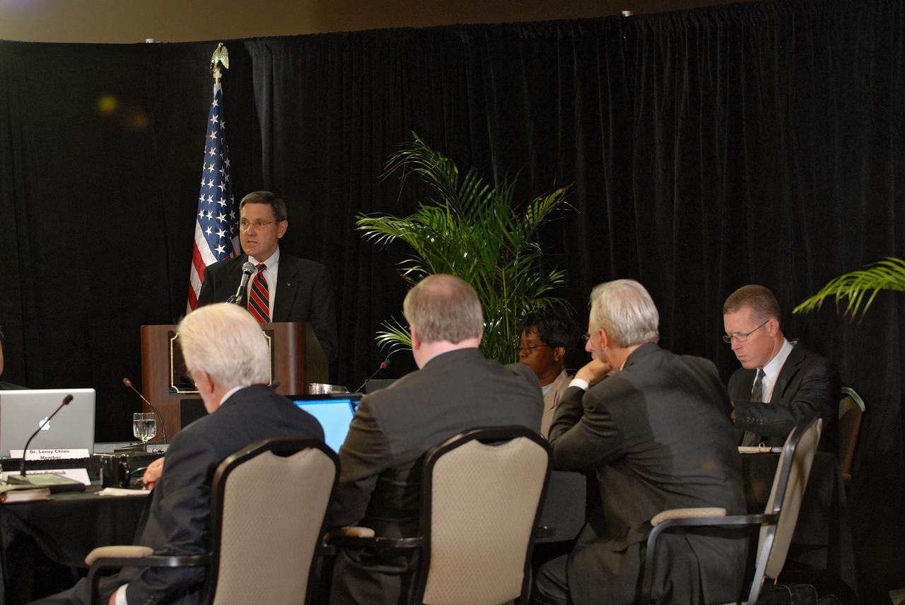 CAPE CANAVERAL, Fla. –  NASA Kennedy Space Center's Center Director Bob Cabana (right) speaks during the meeting of the Augustine Commission in Cocoa Beach, Fla.  At the conference table in the foreground are members of the commission: (from left) Bohdan Bejmuk, chair of Constellation Program Standing Review Board; Jeff Greason, co-founder and CEO of XCOR Aerospace; Dr. Christopher Chyba, professor of Astrophysical Sciences and international Affairs at Princeton University; and Phil McAlister, special assistant for Program Analysis in NASA's Office of Program Analysis and Evaluation.  At the request of the Office of Science and Technology Policy, NASA established the Review of U.S. Human Space Flight Plans Committee, known as the Augustine Commission.  Chaired by  Norman R. Augustine, retired chairman and CEO of Lockheed Martin Corp.,  the committee is conducting an independent review of ongoing U.S. human spaceflight plans and programs, as well as alternatives, to ensure the nation is pursuing the best trajectory for the future of human space flight - one that is safe, innovative, affordable, and sustainable.  Photo credit: NASA/Jim Grossmann