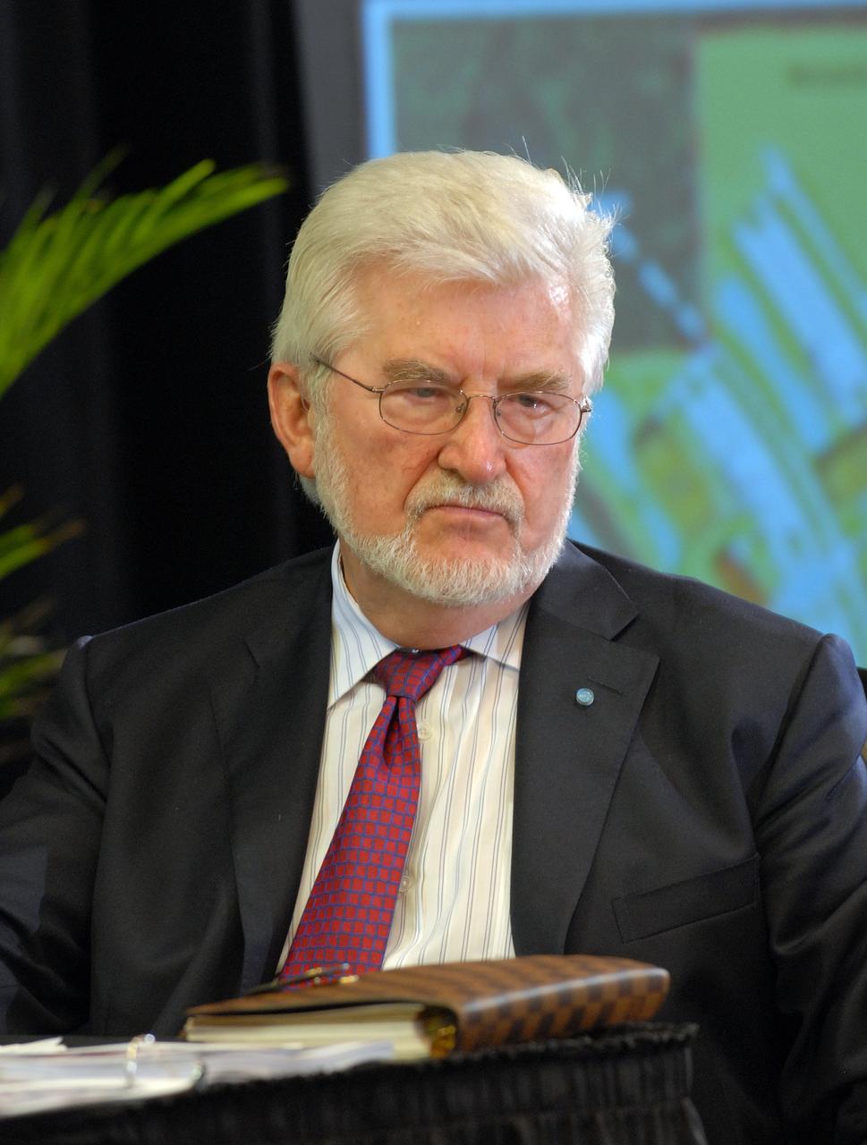 CAPE CANAVERAL, Fla. –  Bohdan Bejmuk, chair of Constellation Program Standing Review Board,  is seated at the conference table for the introduces the Augustine Commission, meeting in Cocoa Beach, Fla.  At the request of the Office of Science and Technology Policy, NASA established the Review of U.S. Human Space Flight Plans Committee, known as the Augustine Commission.  Chaired by  Norman R. Augustine, retired chairman and CEO of Lockheed Martin Corp.,  the committee is conducting an independent review of ongoing U.S. human spaceflight plans and programs, as well as alternatives, to ensure the nation is pursuing the best trajectory for the future of human space flight - one that is safe, innovative, affordable, and sustainable.  Photo credit: NASA/Jim Grossmann