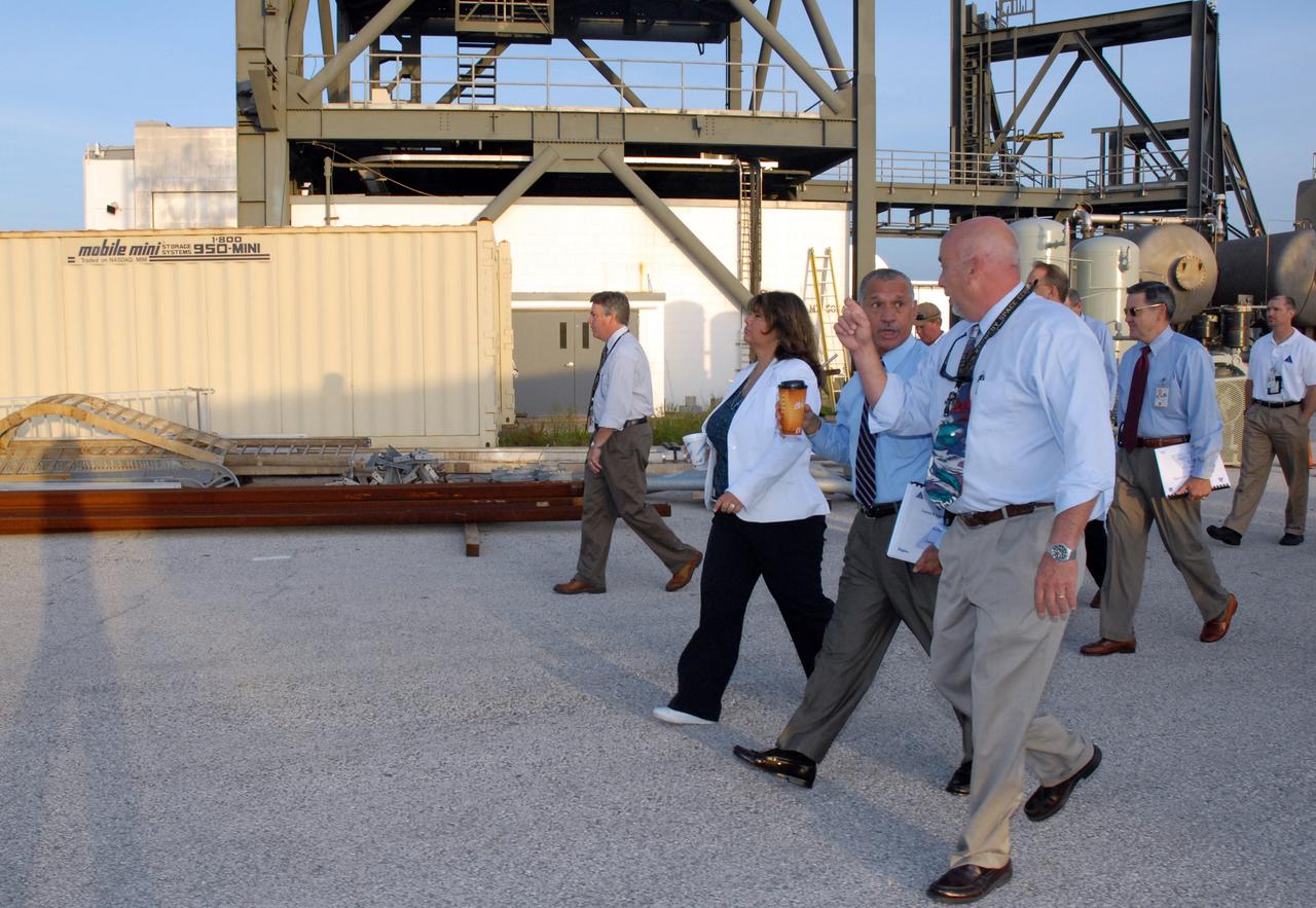 CAPE CANAVERAL, Fla. – NASA Administrator Charles Bolden (second from right) begins a tour of NASA's Kennedy Space Center in Florida with a stop at the Launch Equipment Test Facility, or LETF.  Accompanying him are Tina Palacios (left) and Center Director Bob Cabana (behind Eric Ernst, Kennedy LETF manager). Bolden also was at Kennedy for several events, including the landing of space shuttle Endeavour's STS-127 mission and the signing of the joint NASA-Japan Aerospace Exploration Agency agreement defining the terms of cooperation between the agencies on the Global Precipitation Measurement, or GPM, mission.  Photo credit: NASA/Kim Shiflett