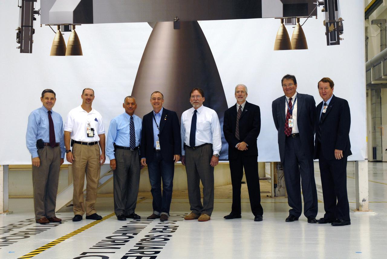 CAPE CANAVERAL, Fla. – Center Director Robert Cabana (left) and Constellation Program directors and managers accompany  NASA Administrator Charles Bolden (third from left) on a tour of NASA's Kennedy Space Center in Florida.  The tour included this stop in the Operations and Checkout Building to view the high bay planned for the assembly of the Constellation Program's Orion crew vehicle. Bolden also was at Kennedy for several events, including the landing of space shuttle Endeavour's STS-127 mission and the signing of the joint NASA-Japan Aerospace Exploration Agency agreement defining the terms of cooperation between the agencies on the Global Precipitation Measurement, or GPM, mission.  Photo credit: NASA/Kim Shiflett