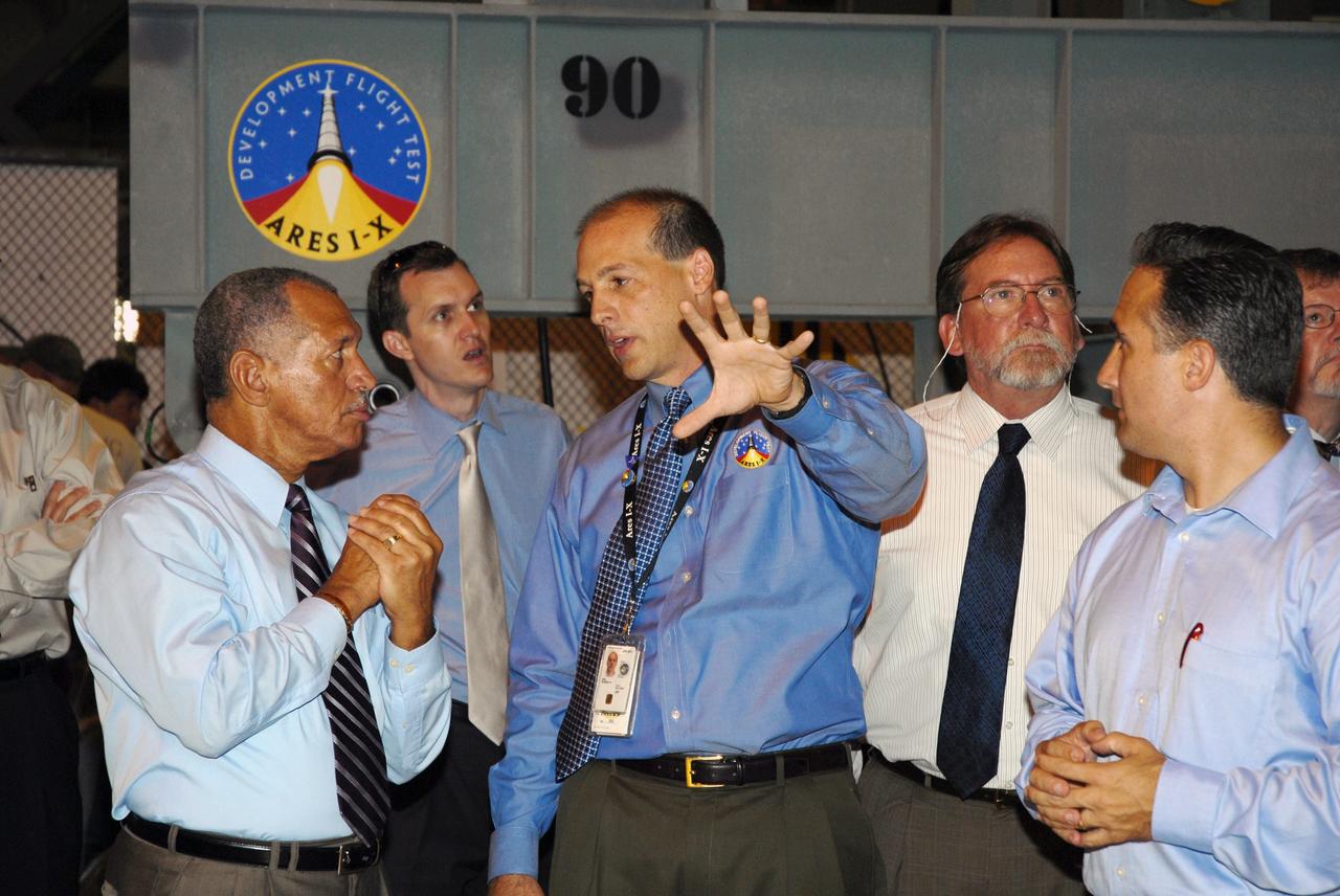 CAPE CANAVERAL, Fla. – At NASA's Kennedy Space Center in Florida, NASA Administrator Charles Bolden learns about the Ares I-X operations from NASA Ares I-X Mission Manager Bob Ess (center). At right are Acting Associate Administrator of Exploration Systems Doug Cook and NASA engineer Trent Smith. Bolden is touring several facilities at Kennedy involved with NASA's Constellation Program. Bolden also was at Kennedy for several events, including the landing of space shuttle Endeavour's STS-127 mission and the signing of the joint NASA-Japan Aerospace Exploration Agency agreement defining the terms of cooperation between the agencies on the Global Precipitation Measurement, or GPM, mission. Photo credit: NASA/Kim Shiflett