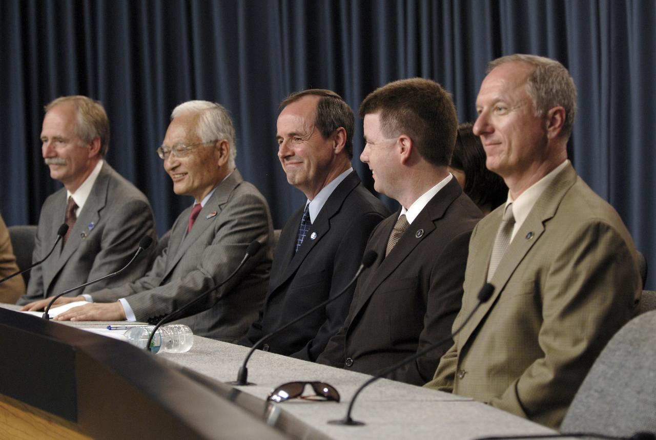 CAPE CANAVERAL, Fla. – At a post-landing news conference at NASA's Kennedy Space Center in Florida,  participants respond with smiles to a question from the media.  From left are  NASA Associate Administrator for Space Operations William Gerstenmaier, President of the Japan Aerospace Exploration Agency Keiji Tachikawa, Director General of Operations in the Canadian Space Agency Benoit Marcotte, space shuttle Launch Integration Manager Mike Moses and STS-127 Launch Director Pete Nickolenko. Space shuttle Endeavour and crew returned to Earth at 10:48 a.m. EDT to conclude the STS-127 mission.  Endeavour delivered the Japanese Experiment Module's Exposed Facility and the Experiment Logistics Module-Exposed Section to the International Space Station. The mission was the 29th flight to the station, the 23rd flight of Endeavour and the 127th in the Space Shuttle Program, as well as the 71st landing at Kennedy.  Photo credit: NASA/Kim Shiflett