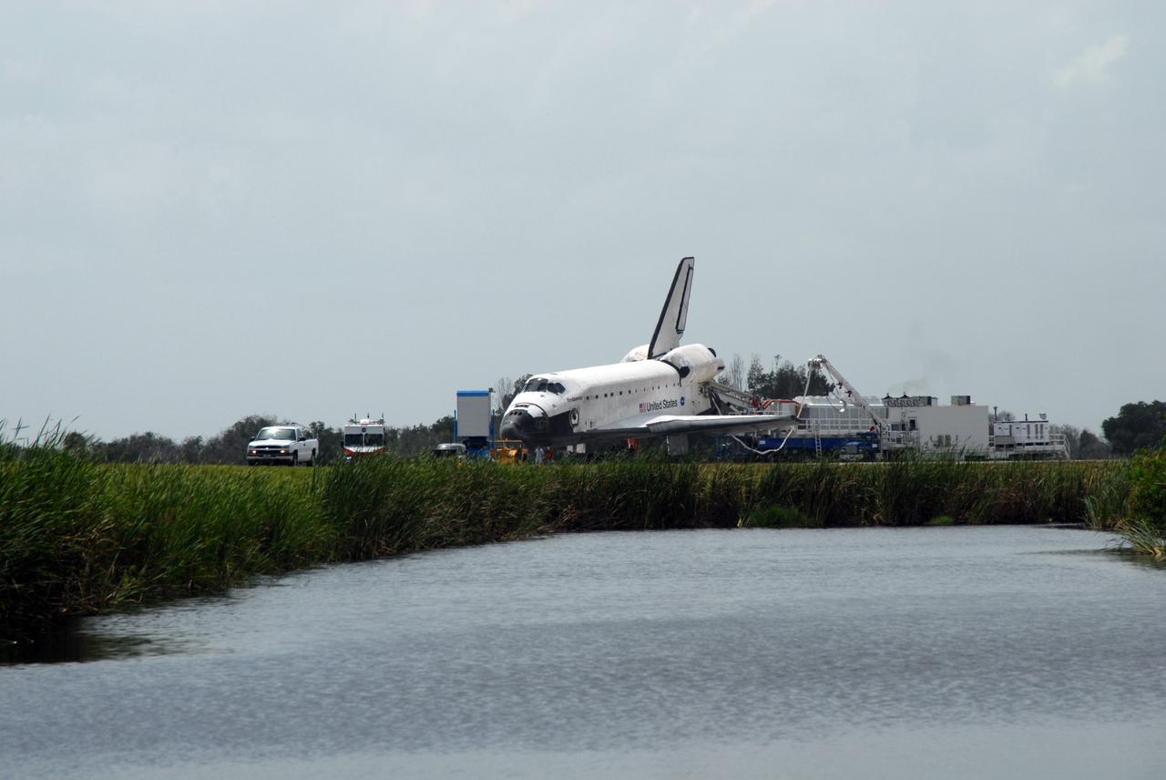 CAPE CANAVERAL, Fla. – At NASA's Kennedy Space Center in Florida, space shuttle Endeavour is prepared to be towed to the Orbiter Processing Facility #2.  Endeavour landed at 10:48 a.m. EDT, completing a journey of 6.5-million miles on the STS-127 mission.   Towing normally begins within four hours after landing and is completed within six hours unless removal of time-sensitive experiments is required on the runway. In the OPF, turnaround processing procedures on Endeavour will include various post-flight deservicing and maintenance functions, which are carried out in parallel with payload removal and the installation of equipment needed for the next mission. The STS-127 mission was the 29th flight to the station, the 23rd flight of Endeavour and the 71st landing at Kennedy.   Photo credit: NASA/Jim Grossmann